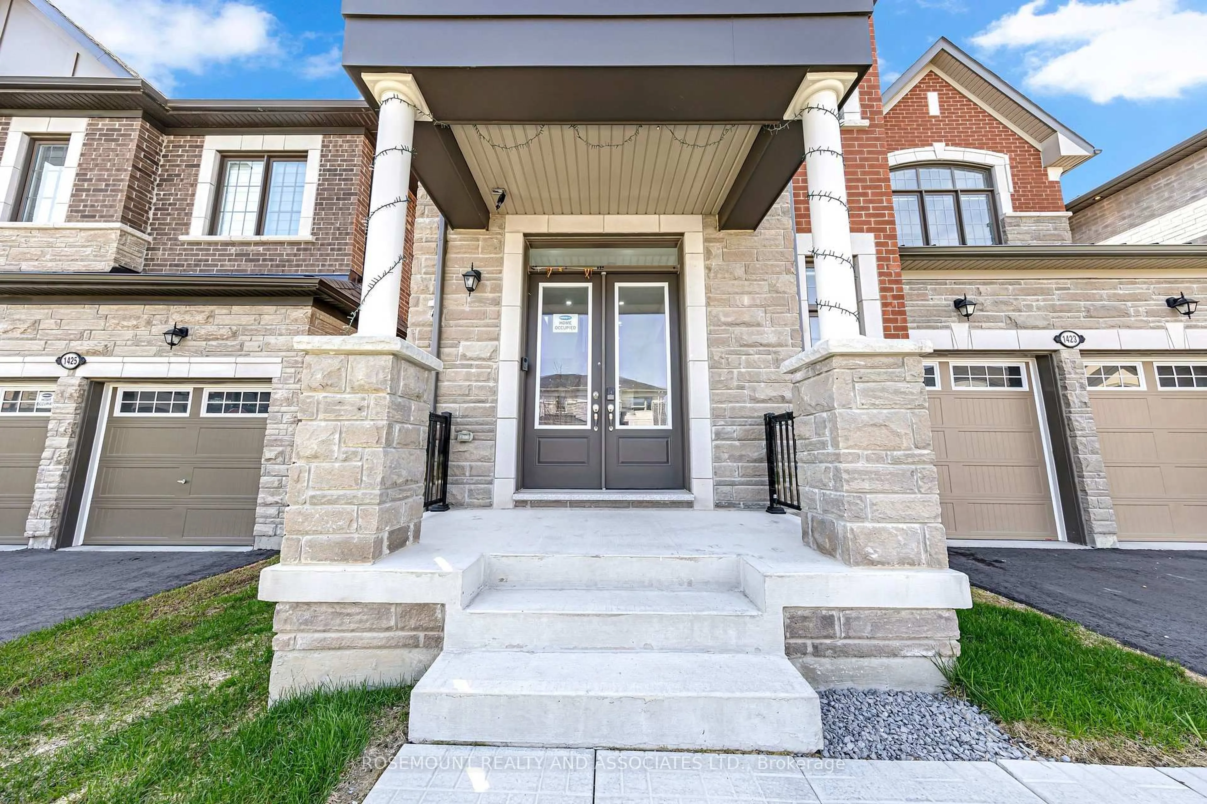 Home with brick exterior material, street for 1423 Swallowtail Lane, Pickering Ontario L1X 0N8