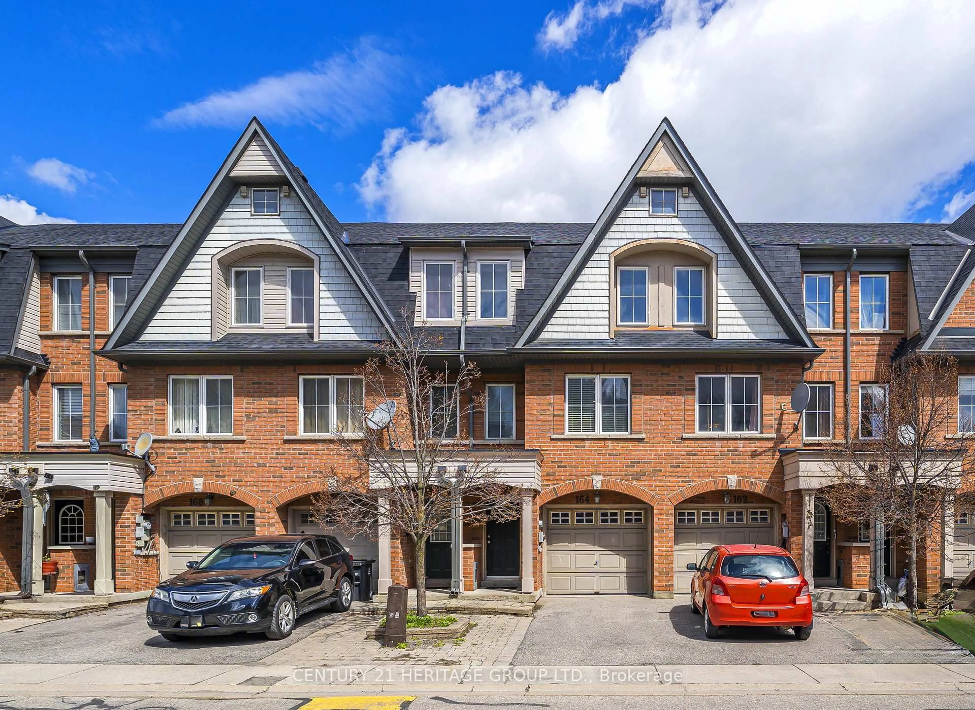Home with brick exterior material, street for 164 Jenkinson Way, Toronto Ontario M1P 5H4