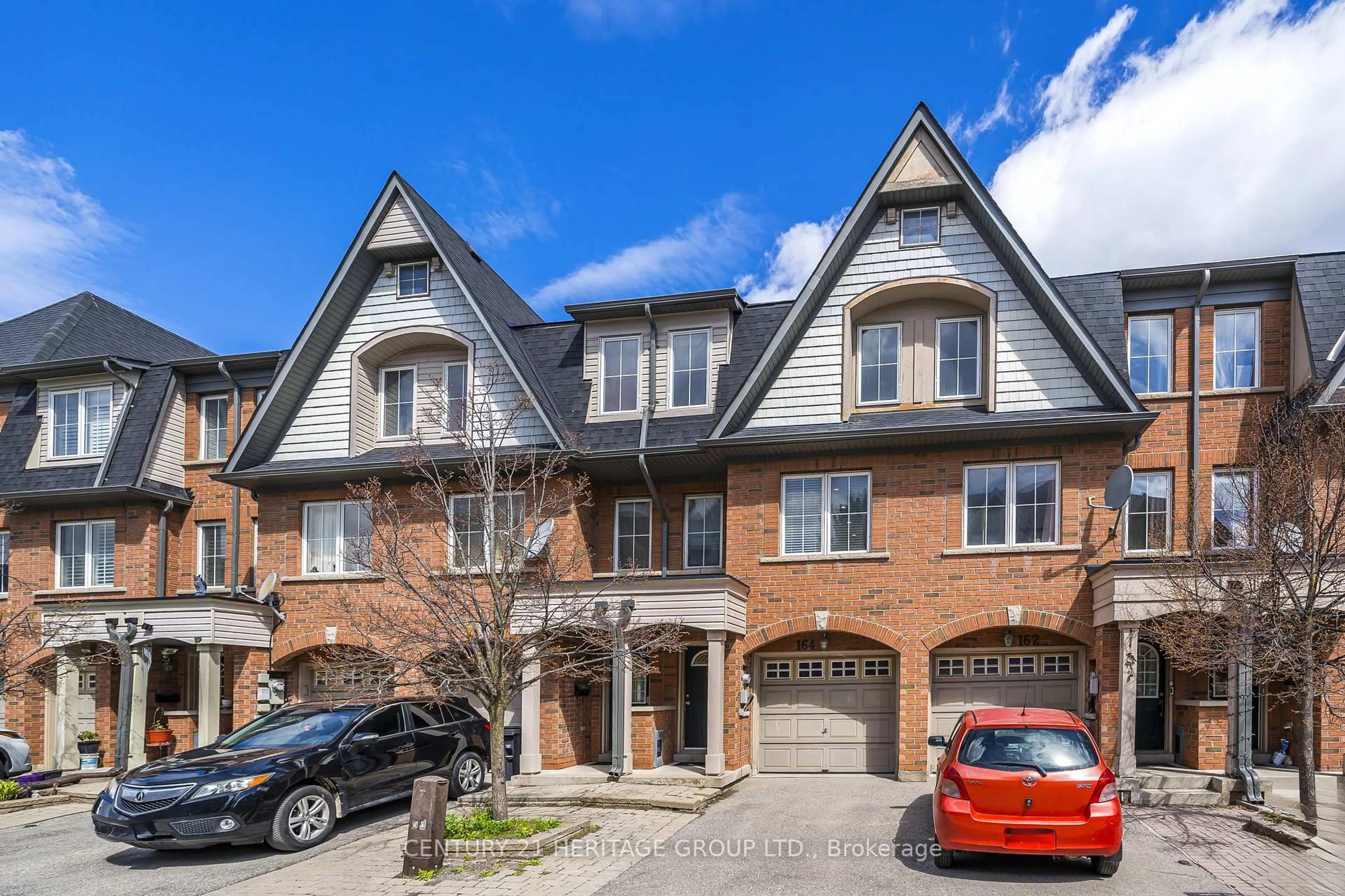 Home with brick exterior material, street for 164 Jenkinson Way, Toronto Ontario M1P 5H4