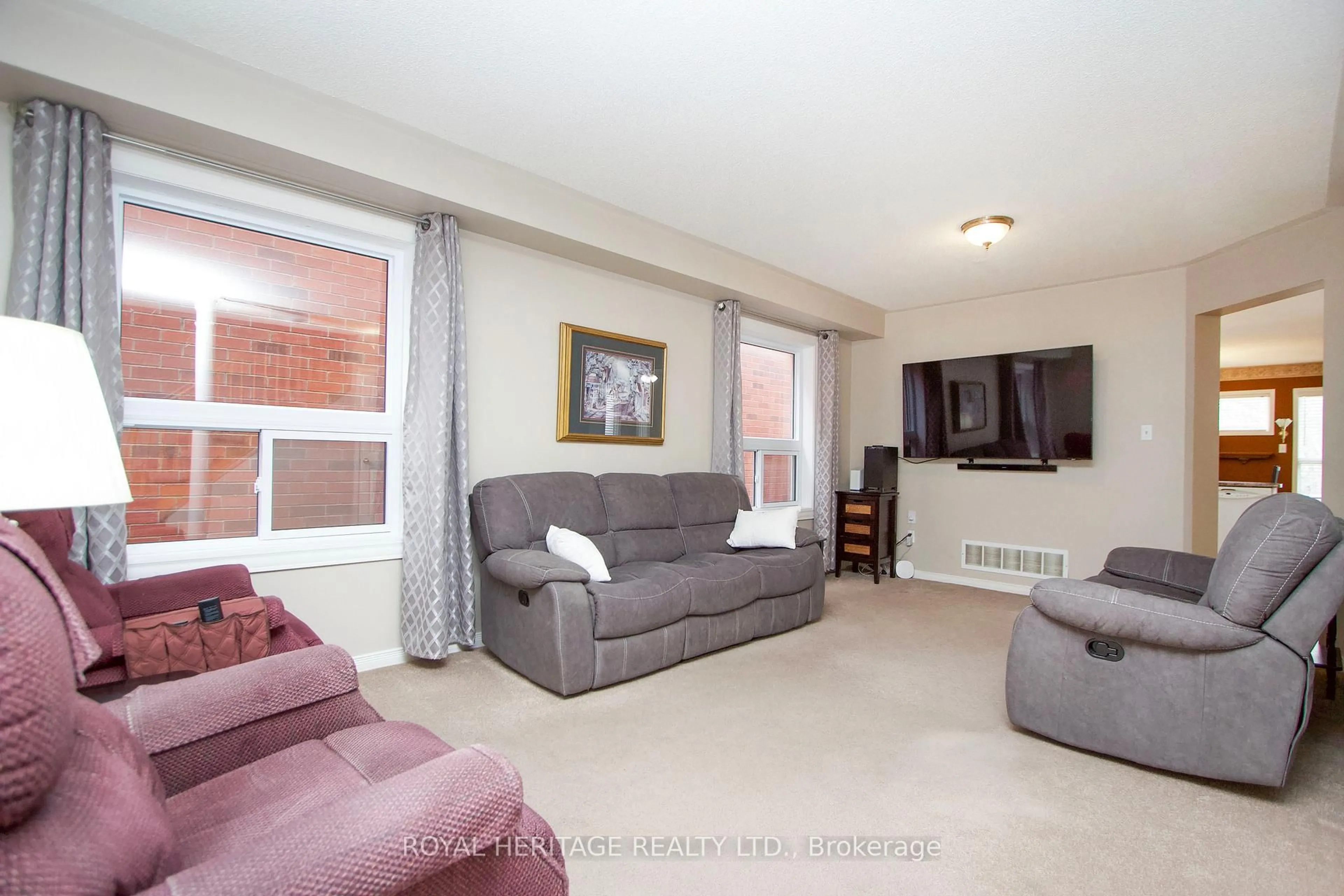 Living room with furniture, unknown for 92 Booth Cres, Ajax Ontario L1Z 1H7
