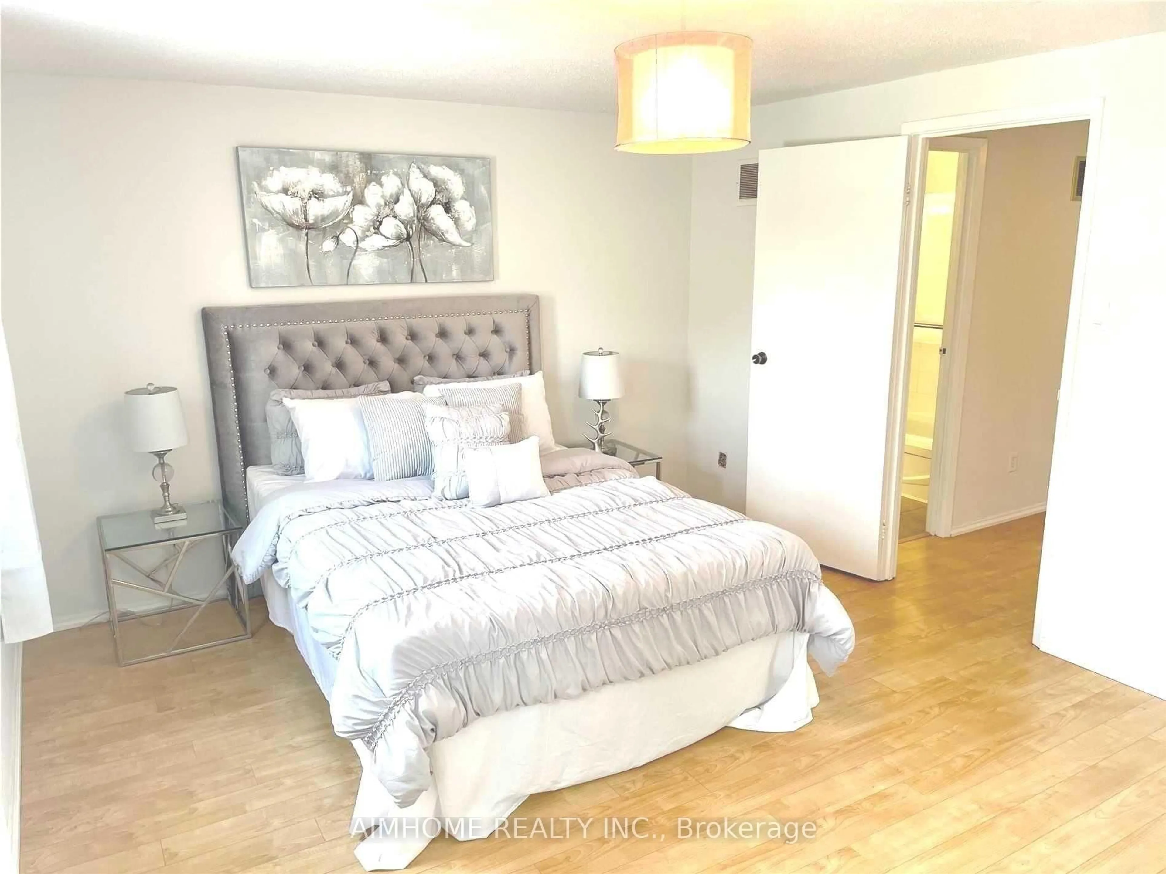 Bedroom with bed, wood/laminate floor for 180 Valley Stream Dr, Toronto Ontario M1V 2A5