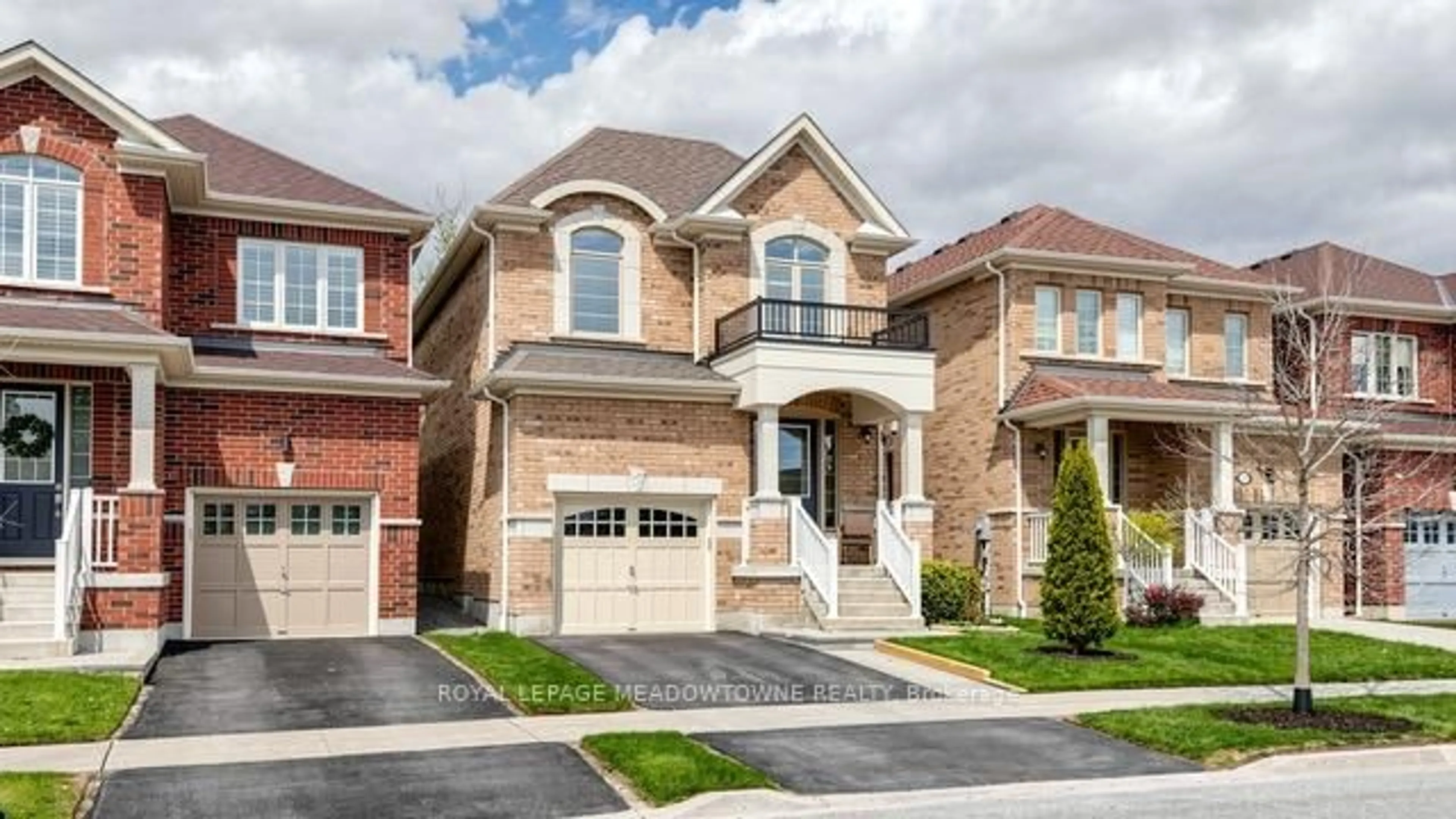 Home with brick exterior material, street for 126 Bridlewood Blvd, Whitby Ontario L1R 0N2