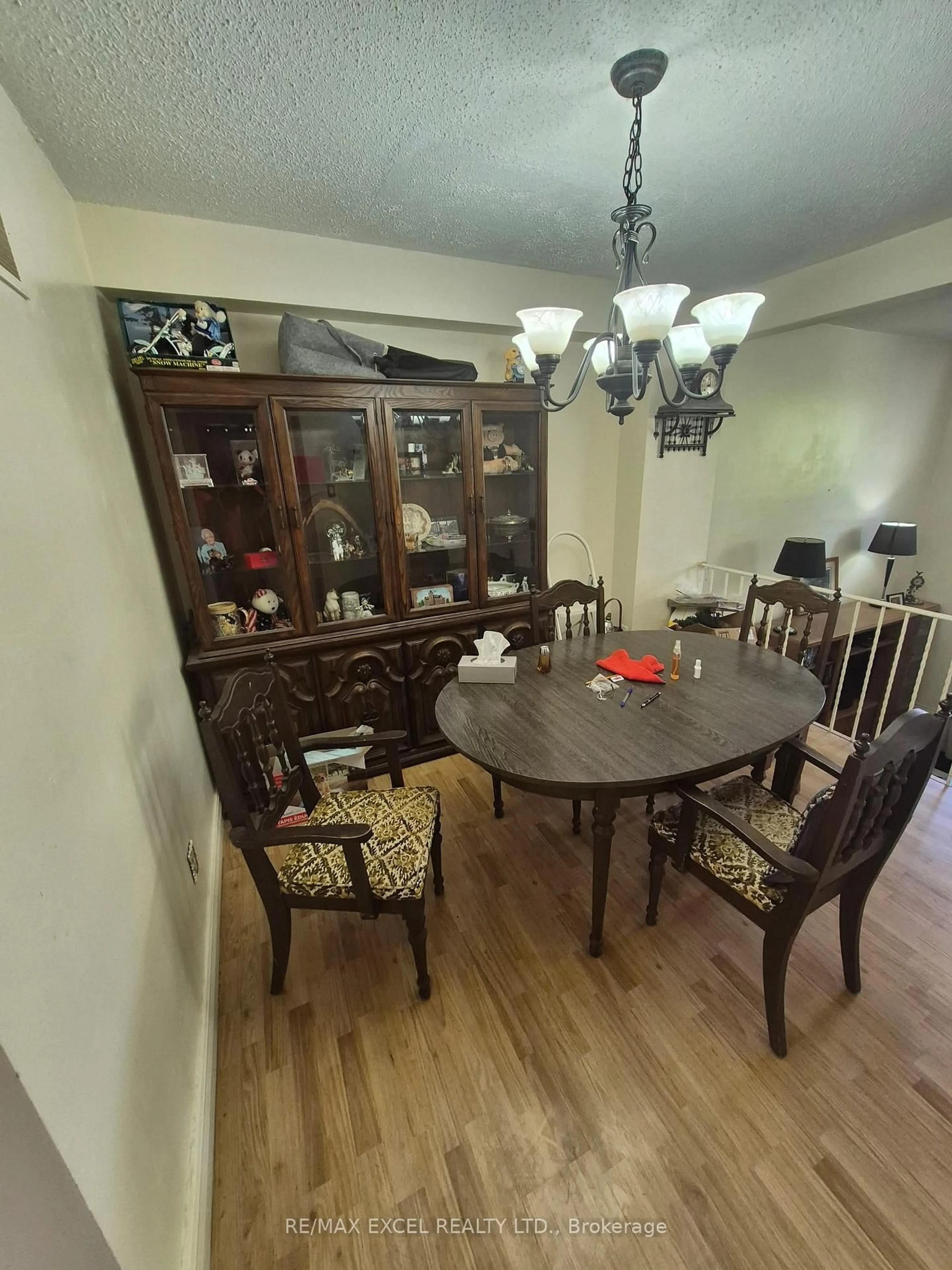 Dining room, wood/laminate floor for 4662 Kingston Rd #106, Toronto Ontario M1E 4Y7
