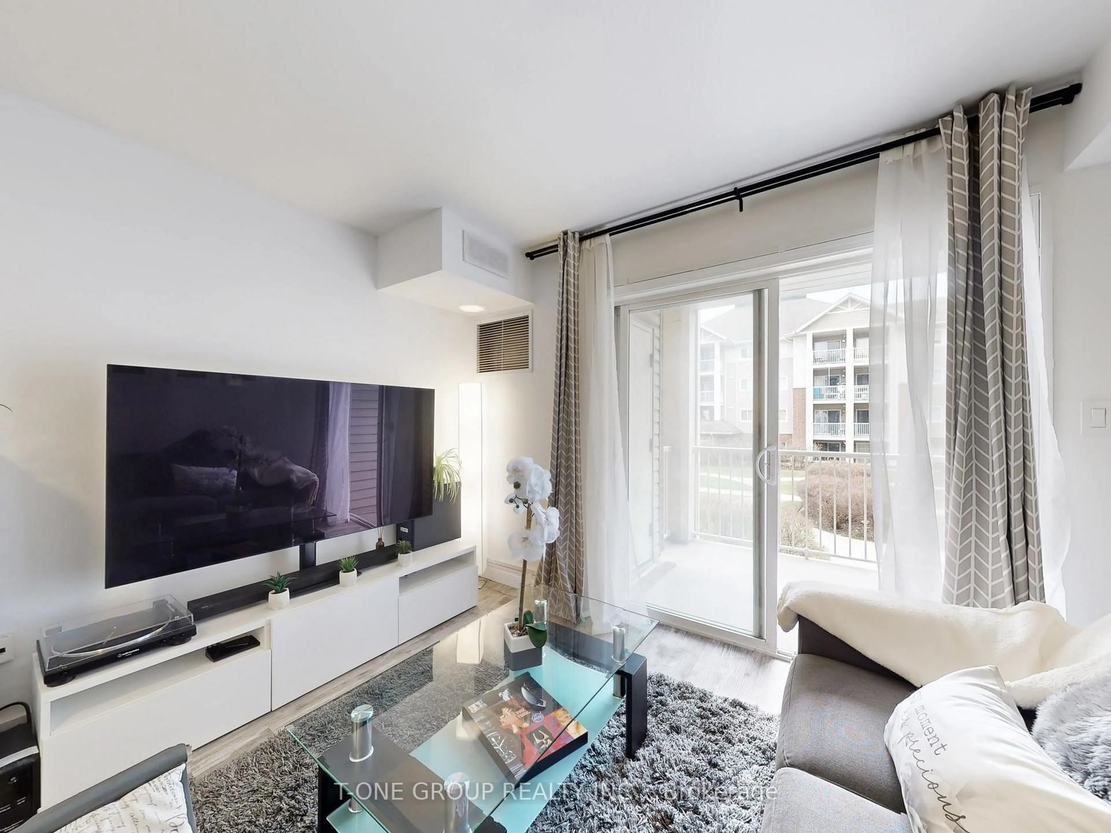 Living room with furniture, unknown for 5225 Finch Ave #217, Toronto Ontario M1S 5W8