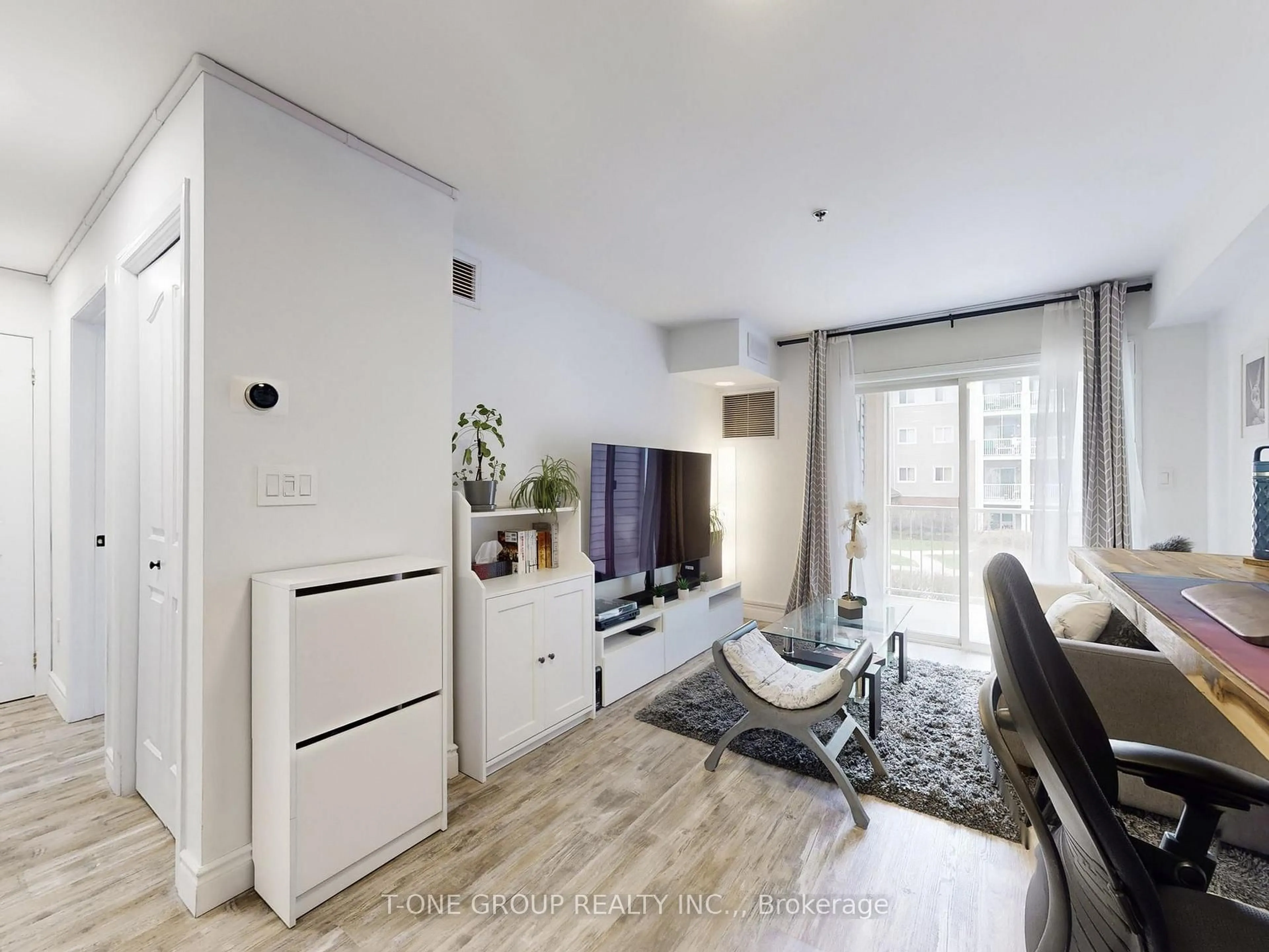 Living room with furniture, unknown for 5225 Finch Ave #217, Toronto Ontario M1S 5W8