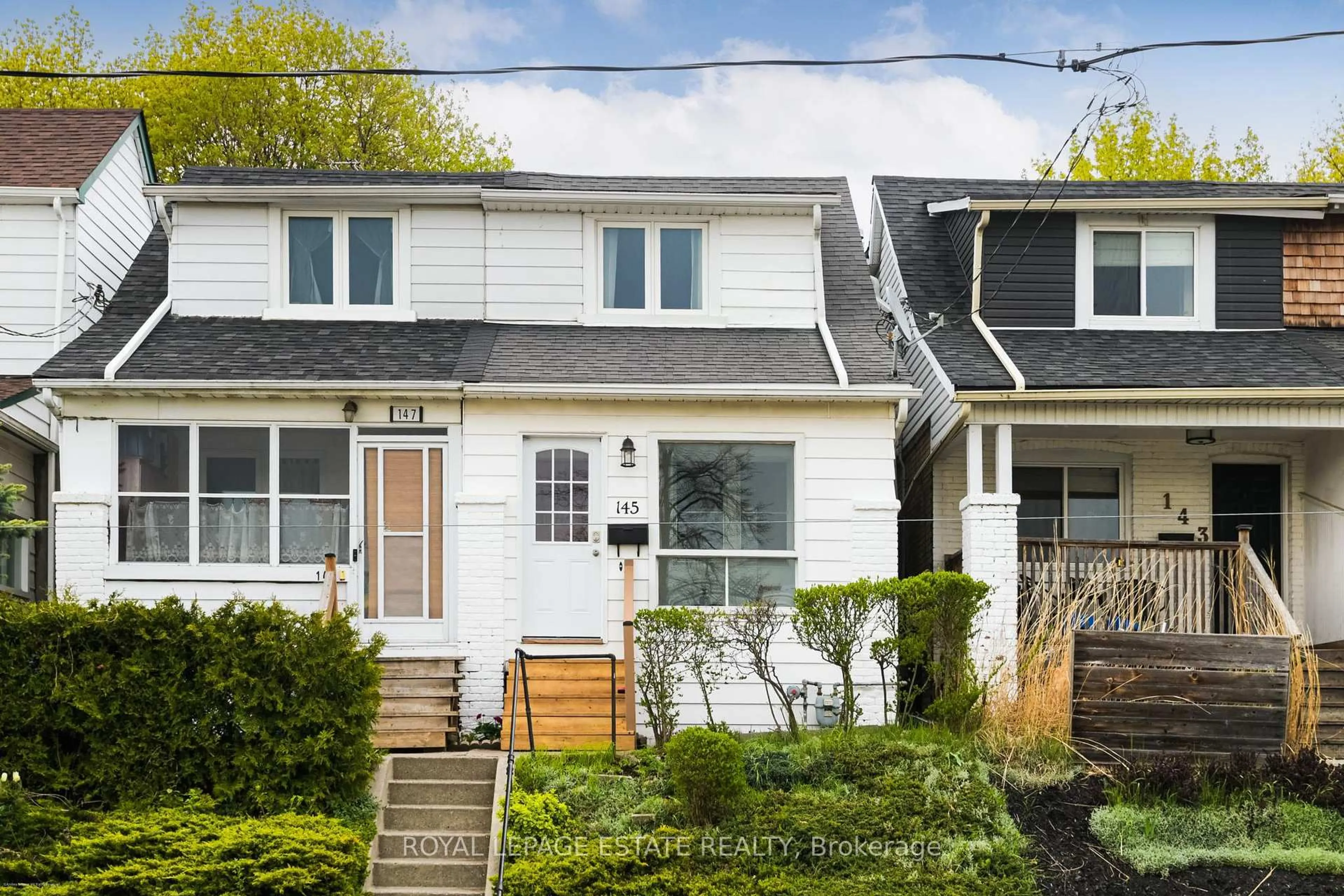 Home with vinyl exterior material, street for 145 Hillingdon Ave, Toronto Ontario M4C 3J1