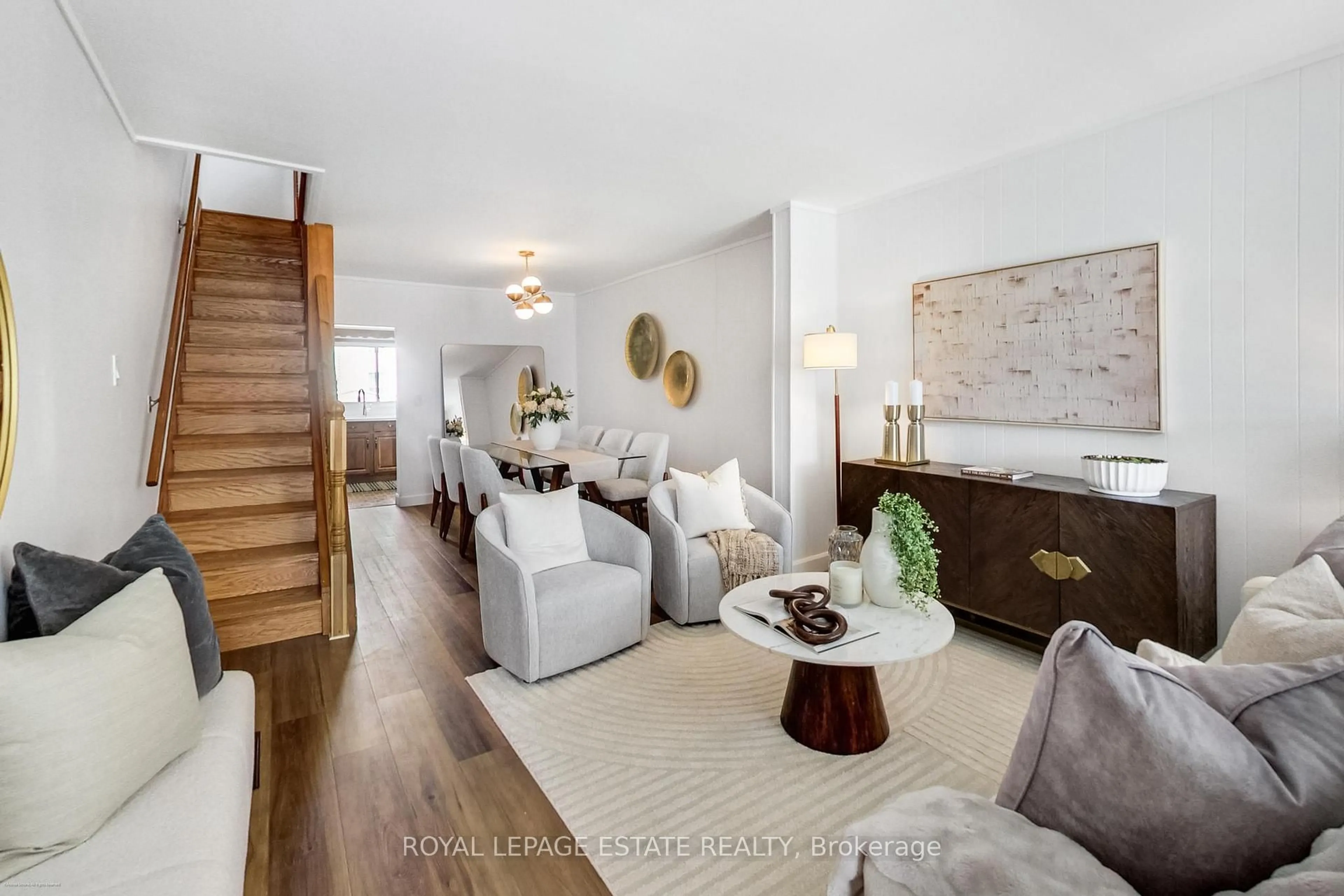 Living room with furniture, wood/laminate floor for 145 Hillingdon Ave, Toronto Ontario M4C 3J1