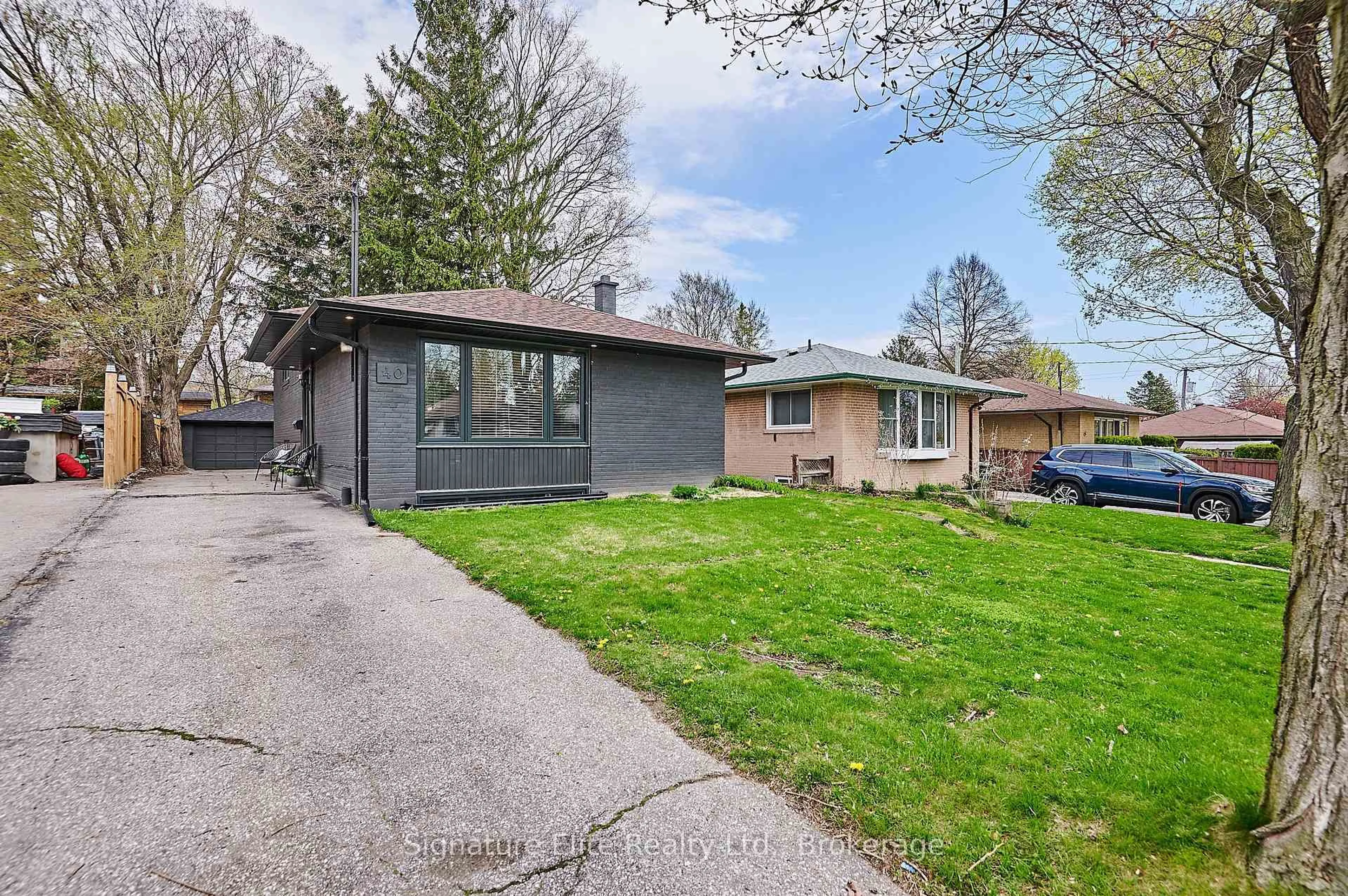 Home with vinyl exterior material, street for 40 Stoney Creek Dr, Toronto Ontario M1E 3L3