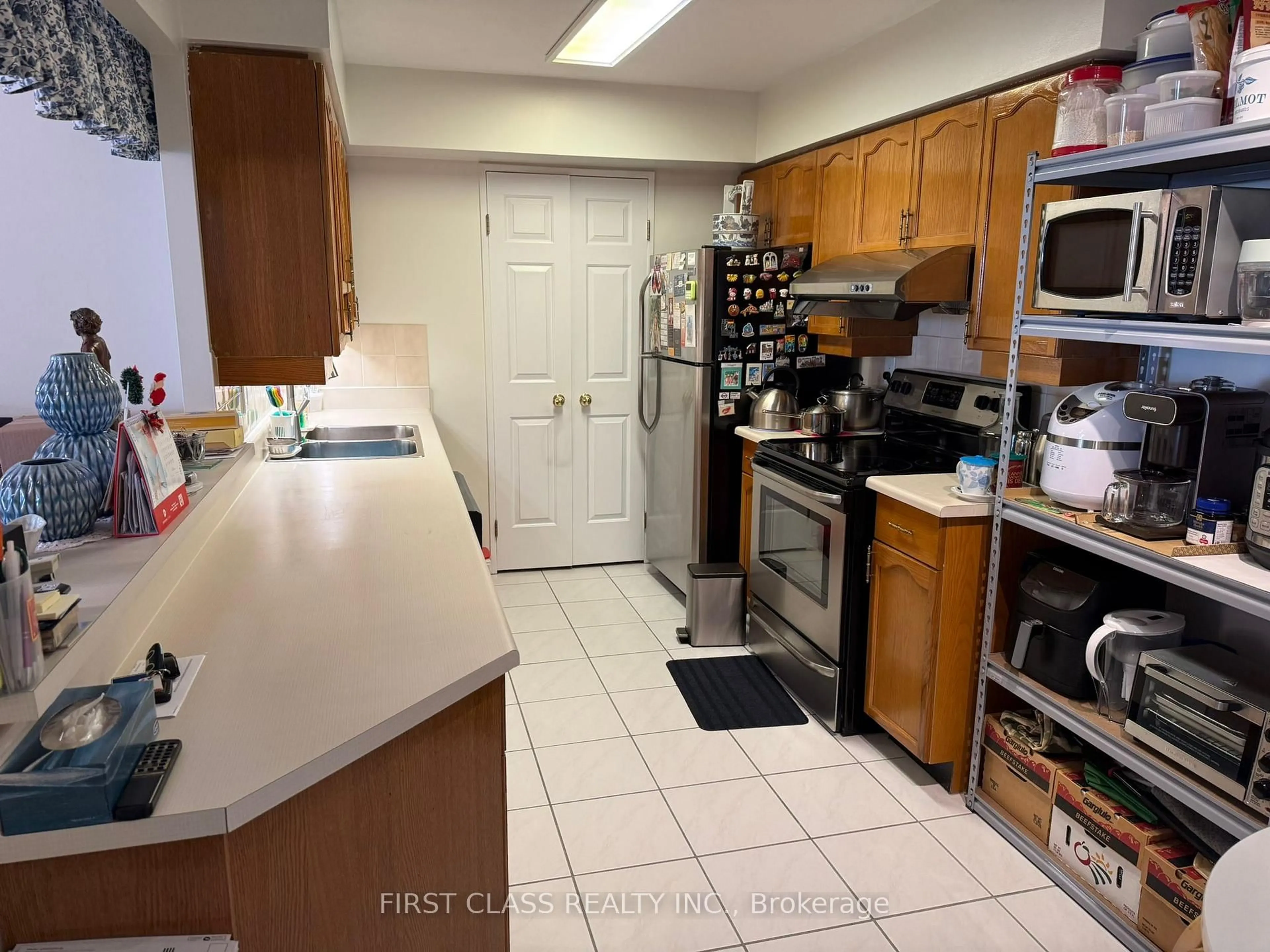 Standard kitchen, unknown for 175 Bamburgh Circ #708, Toronto Ontario M1W 3X8