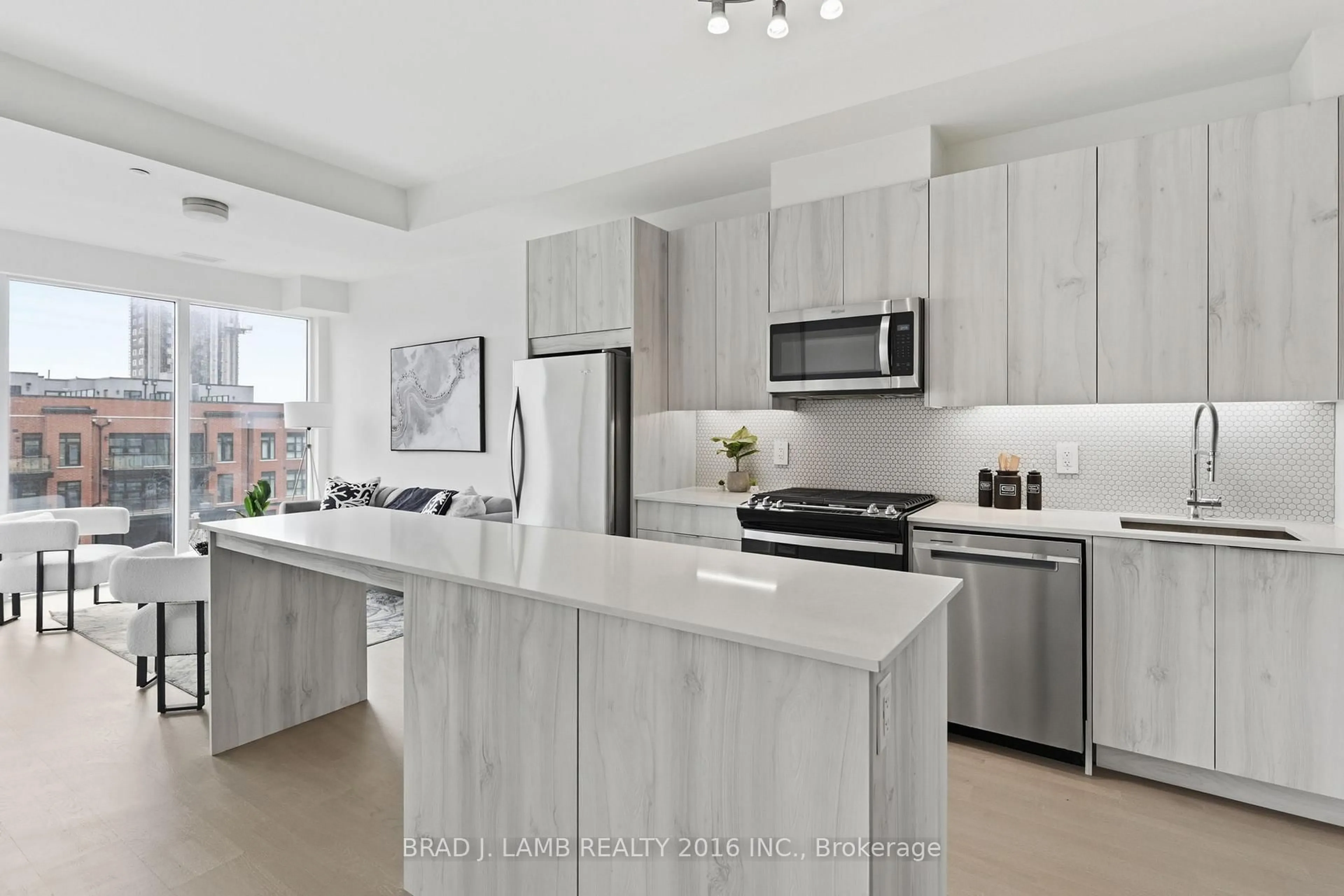 Open concept kitchen, ceramic/tile floor for 495 Logan Ave #413, Toronto Ontario M4K 0A5