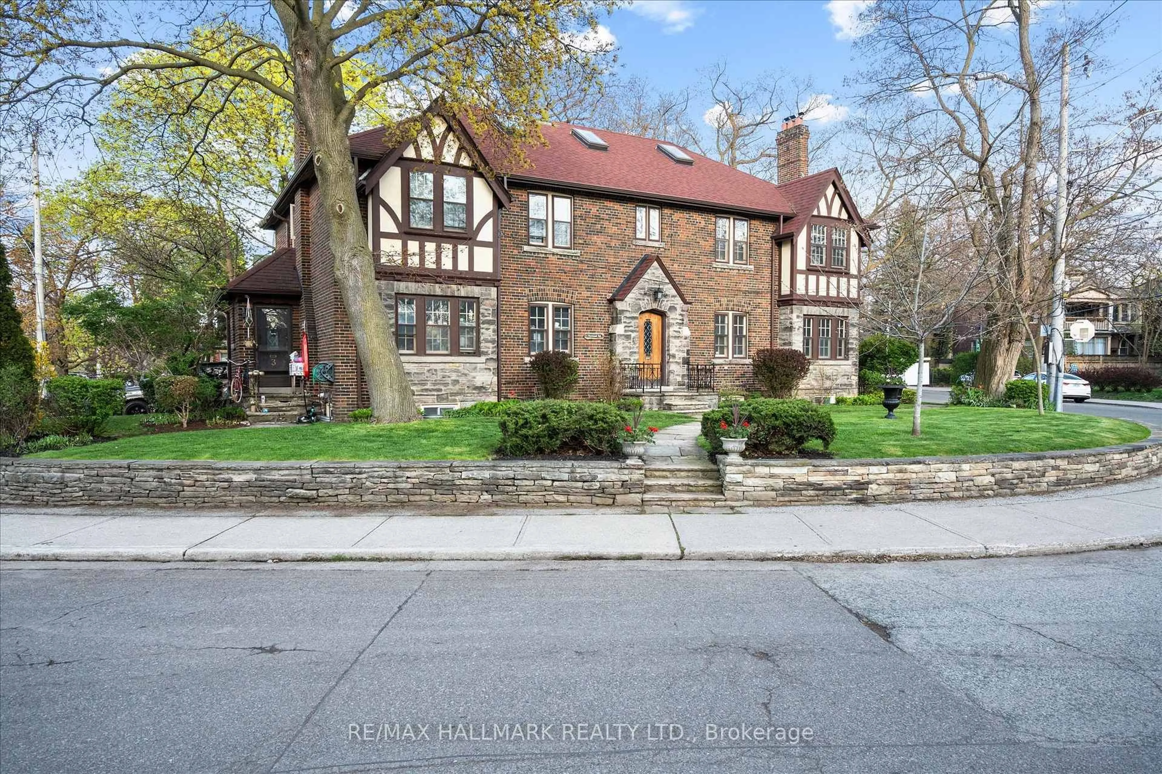 Home with brick exterior material, street for 50 Benlamond Ave, Toronto Ontario M4E 1Y9