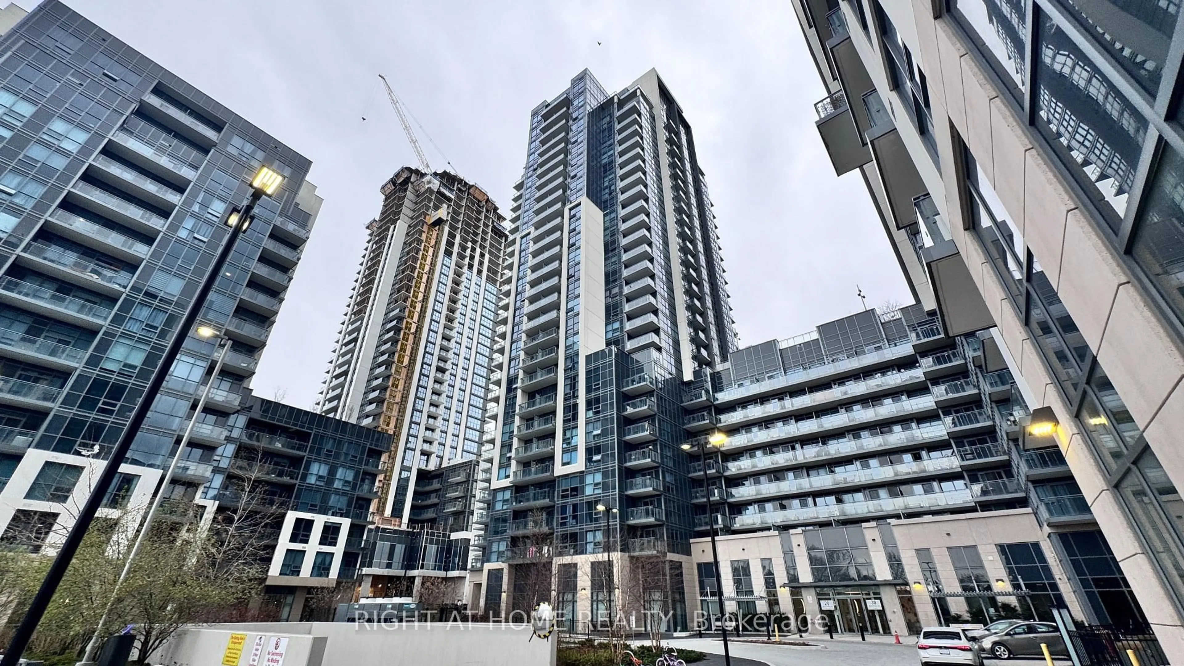 A pic from outside/outdoor area/front of a property/back of a property/a pic from drone, city buildings view from balcony for 20 Meadowglen Pl #824, Toronto Ontario M1G 0A9