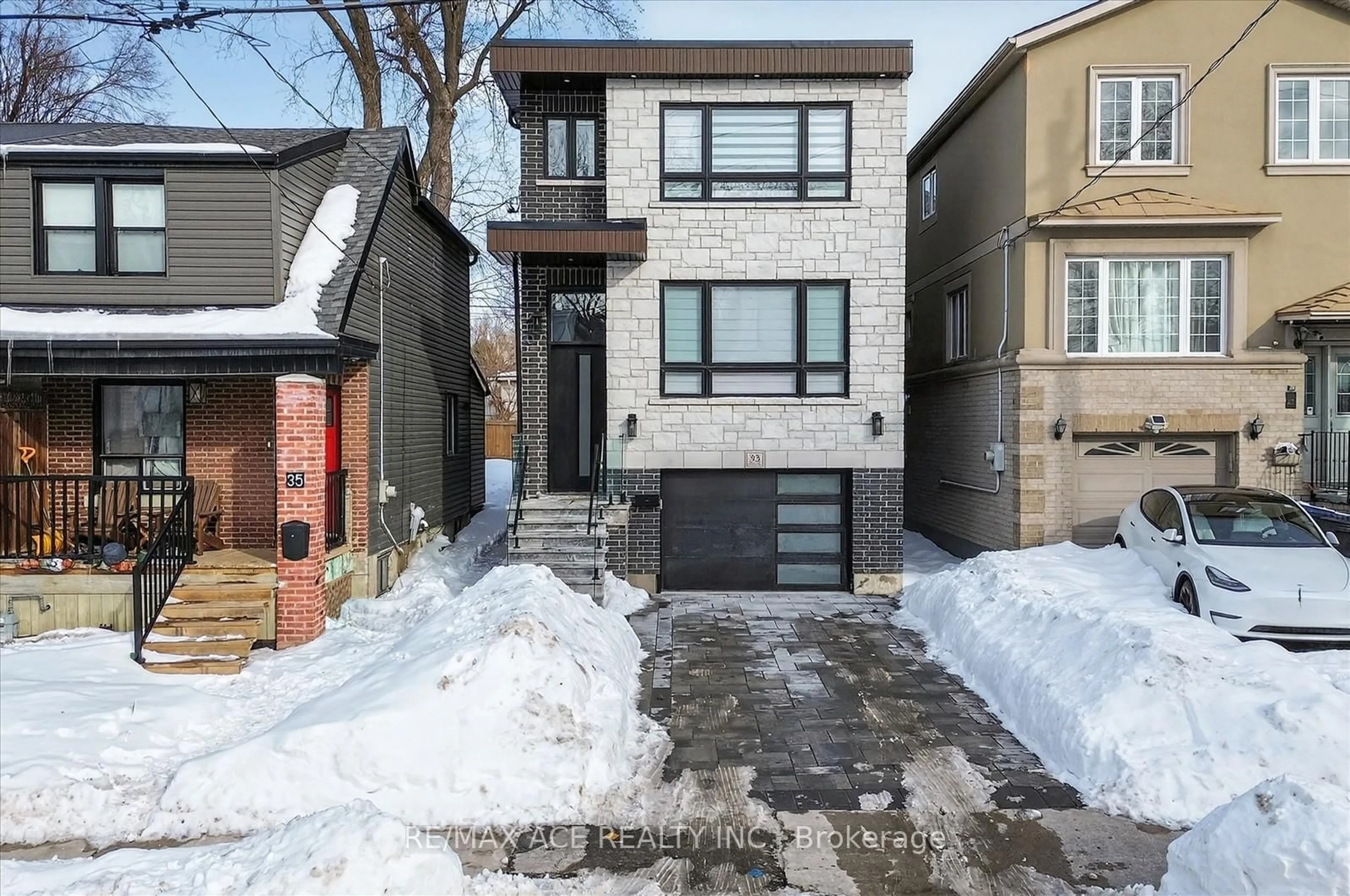 Home with brick exterior material, street for 33 August Ave, Toronto Ontario M1L 3M8