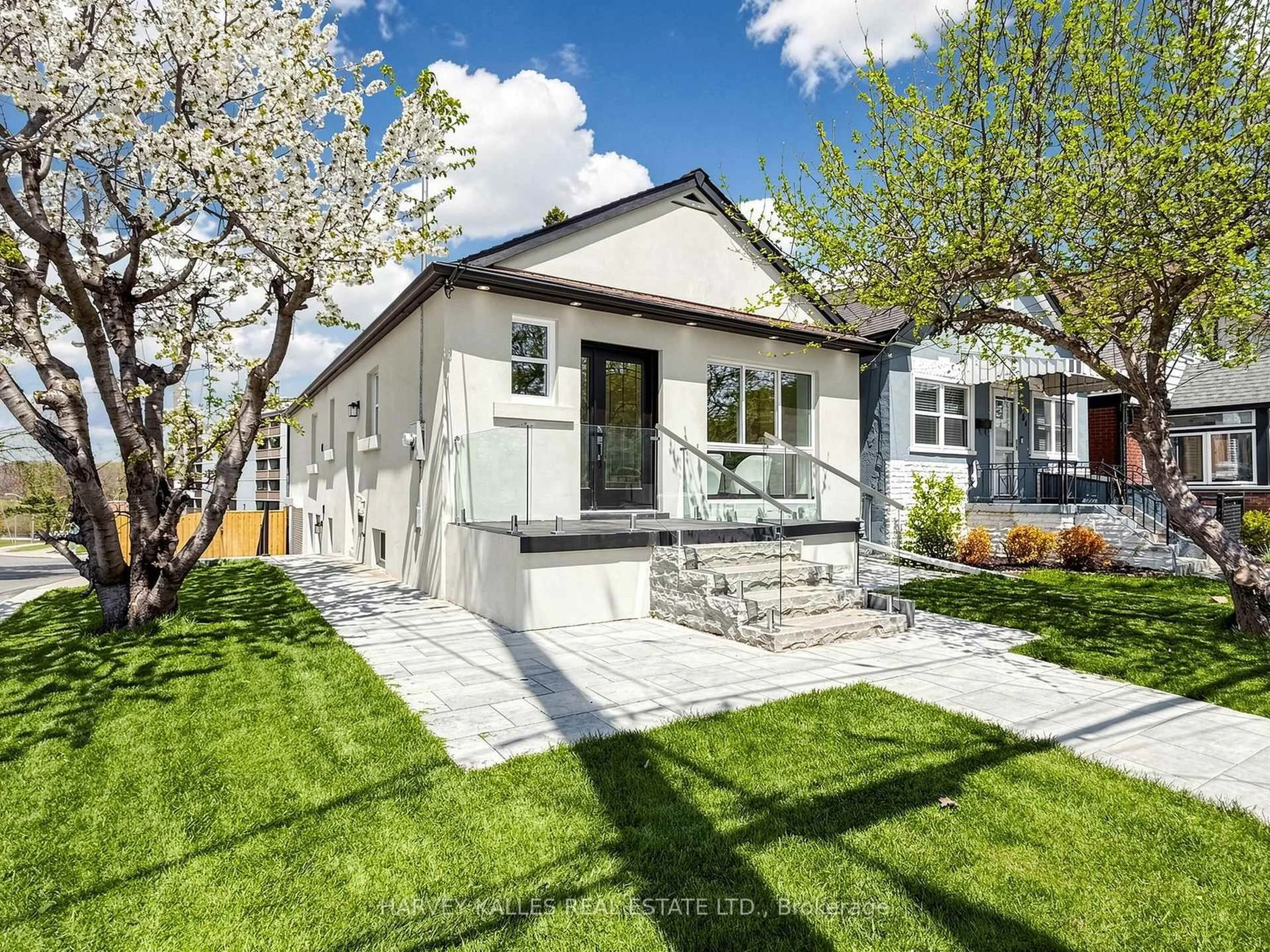 Home with brick exterior material, street for 982 Cosburn Ave, Toronto Ontario M4C 2X1