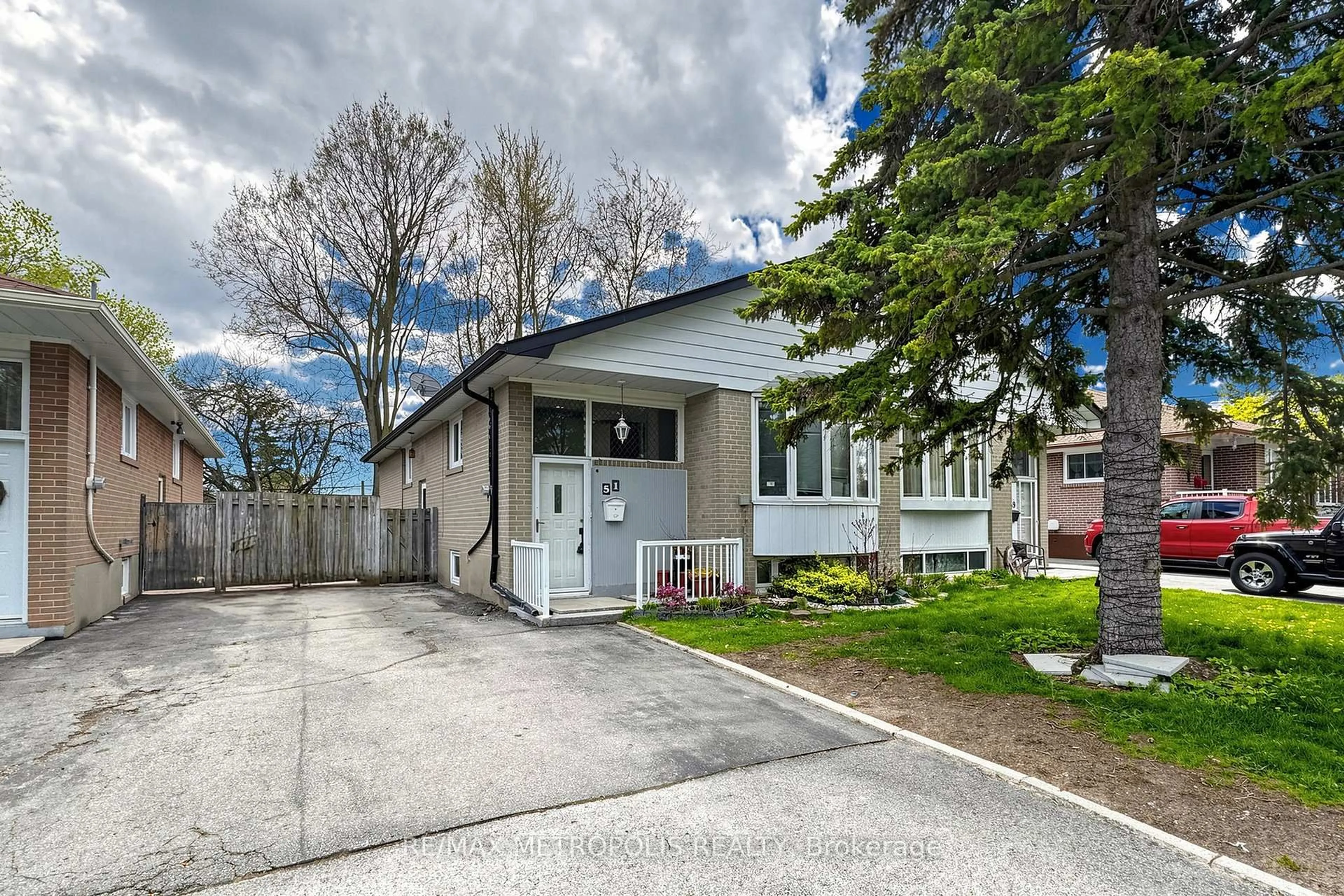 Home with vinyl exterior material, street for 51 Greyabbey Tr, Toronto Ontario M1E 1V8