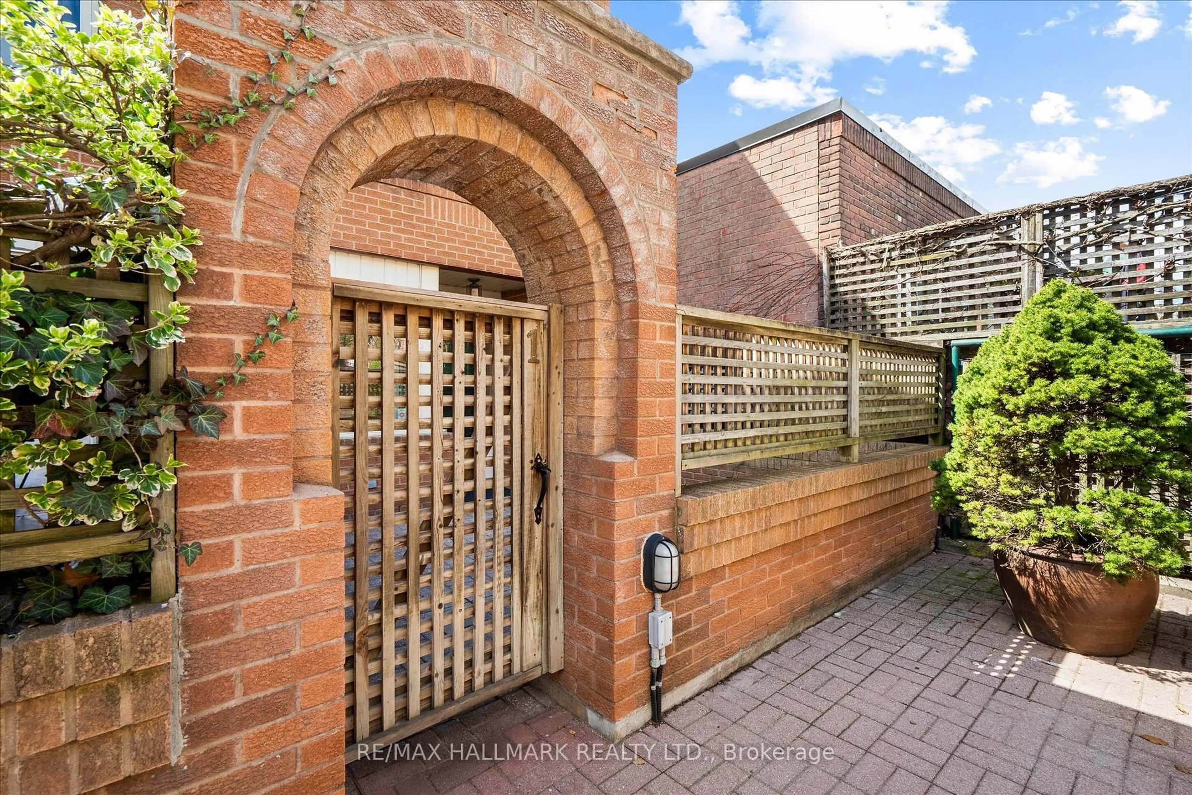 A pic from outside/outdoor area/front of a property/back of a property/a pic from drone, street for 122 Glen Manor Dr #1, Toronto Ontario M4E 2X6