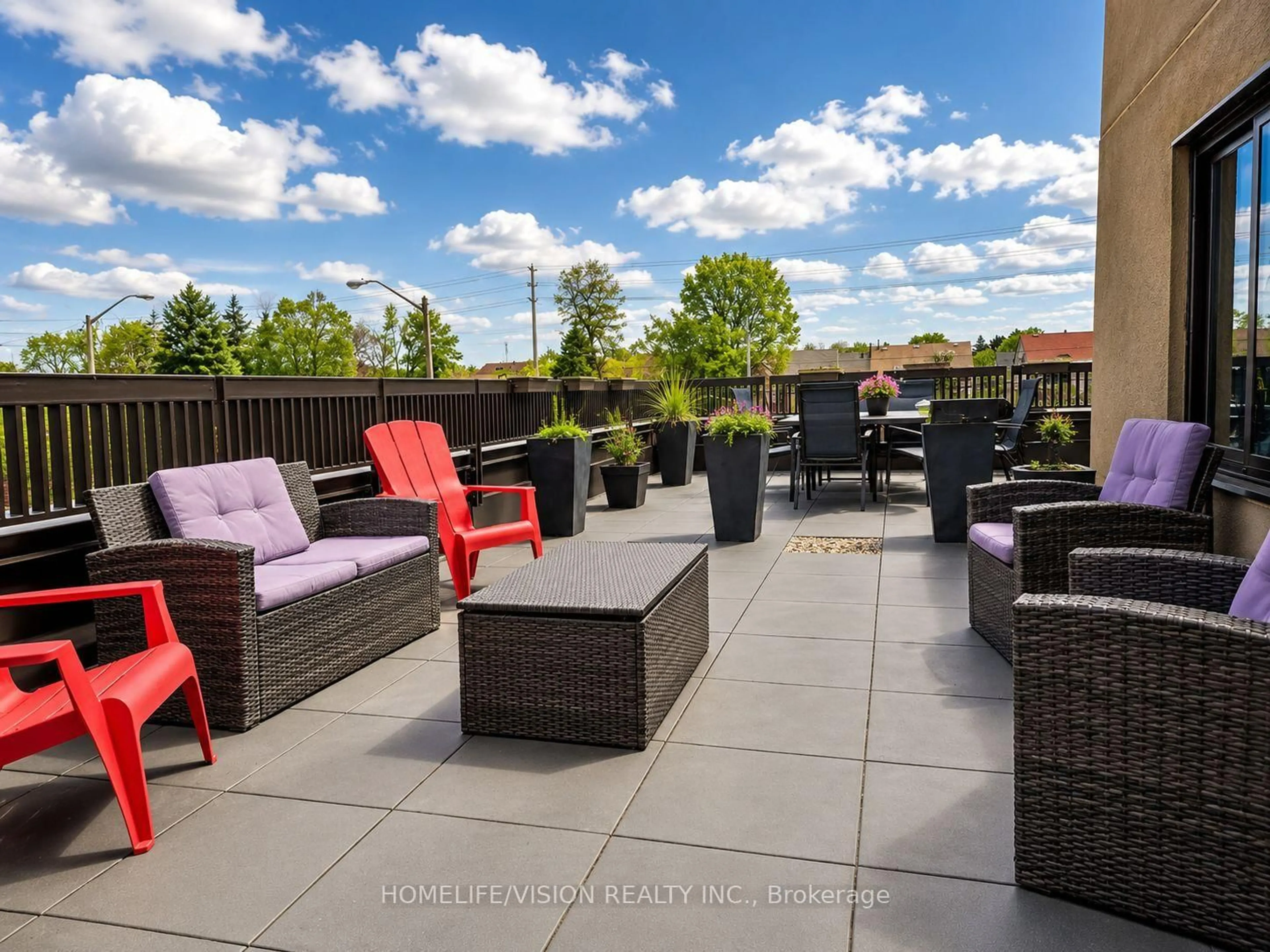 Patio, city buildings view from balcony for 5800 Sheppard Ave #213, Toronto Ontario M1B 5J7