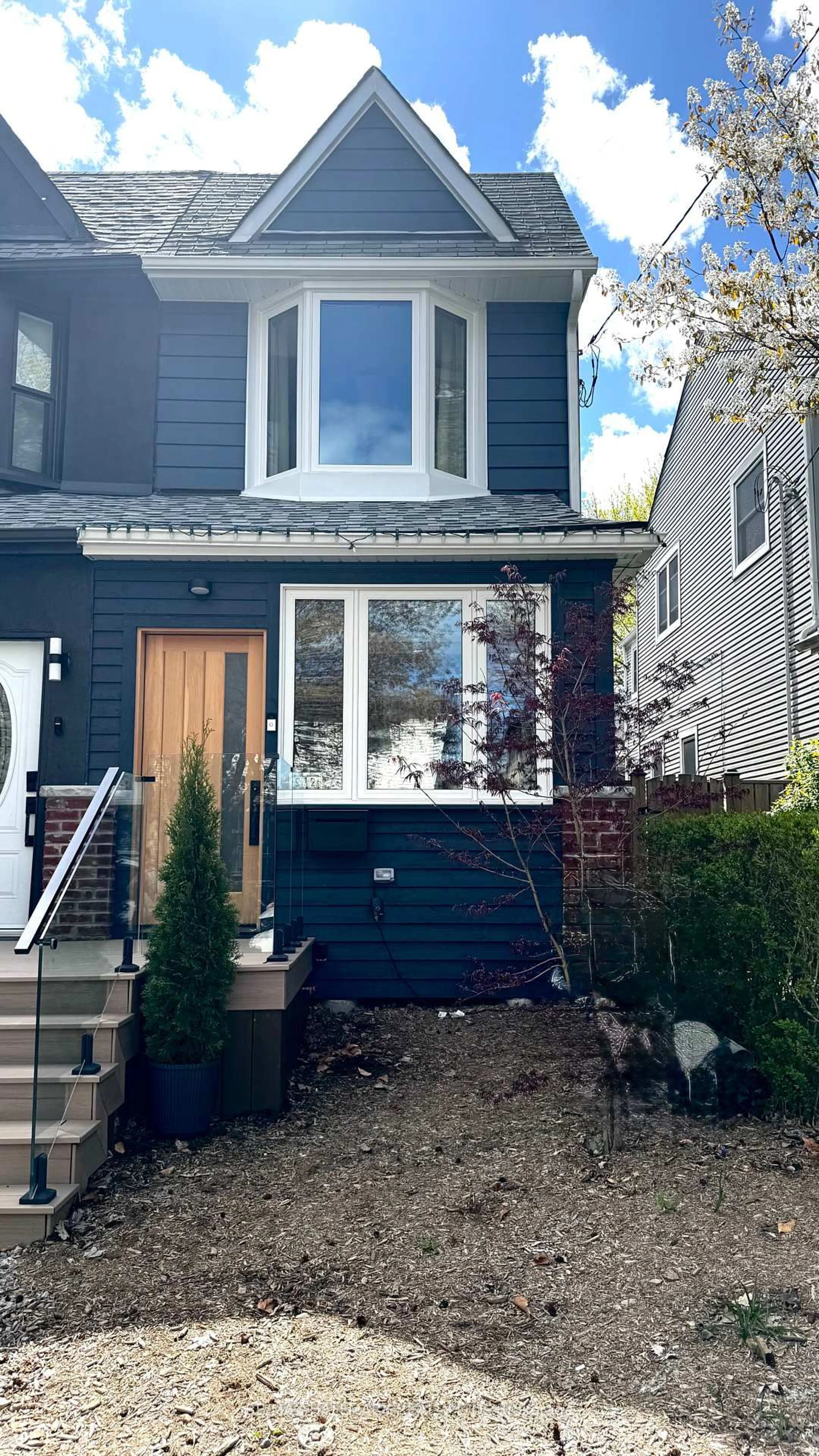 Home with vinyl exterior material, street for 72 Hastings Ave, Toronto Ontario M4L 2L2