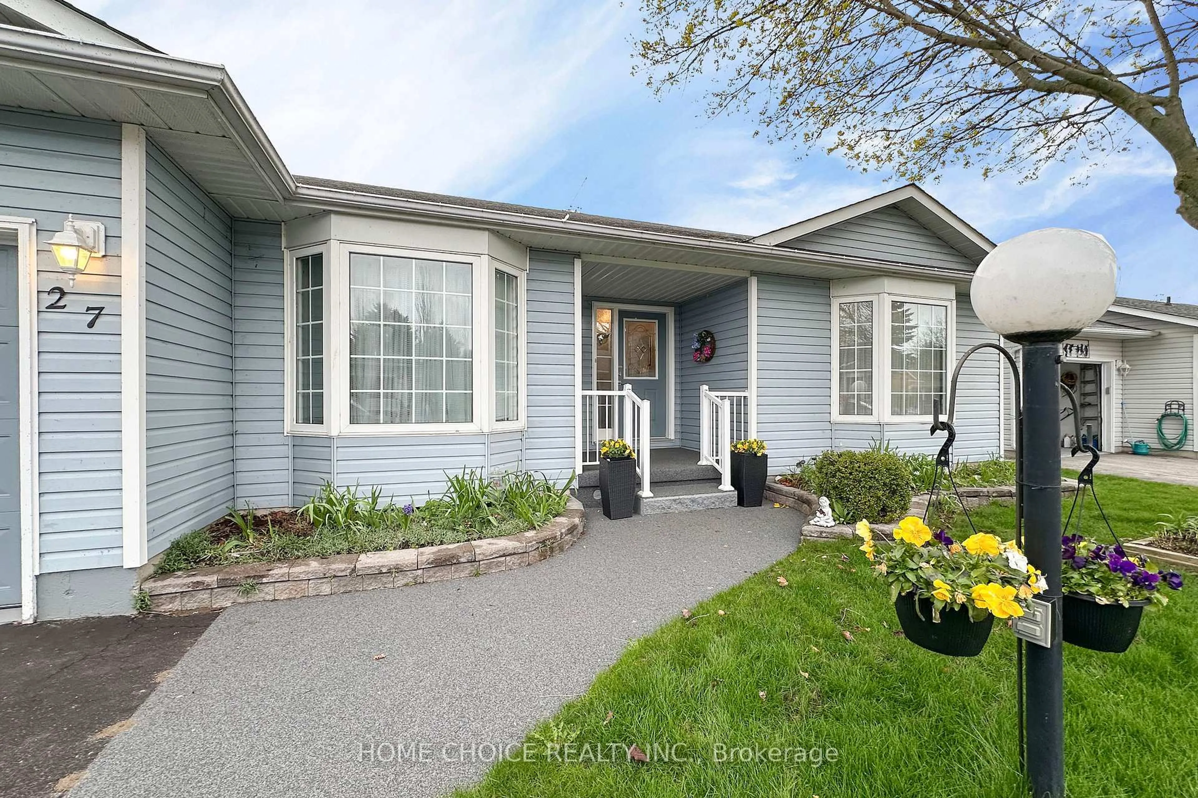 Home with vinyl exterior material, street for 27 Niagara Tr, Clarington Ontario L1B 1A2