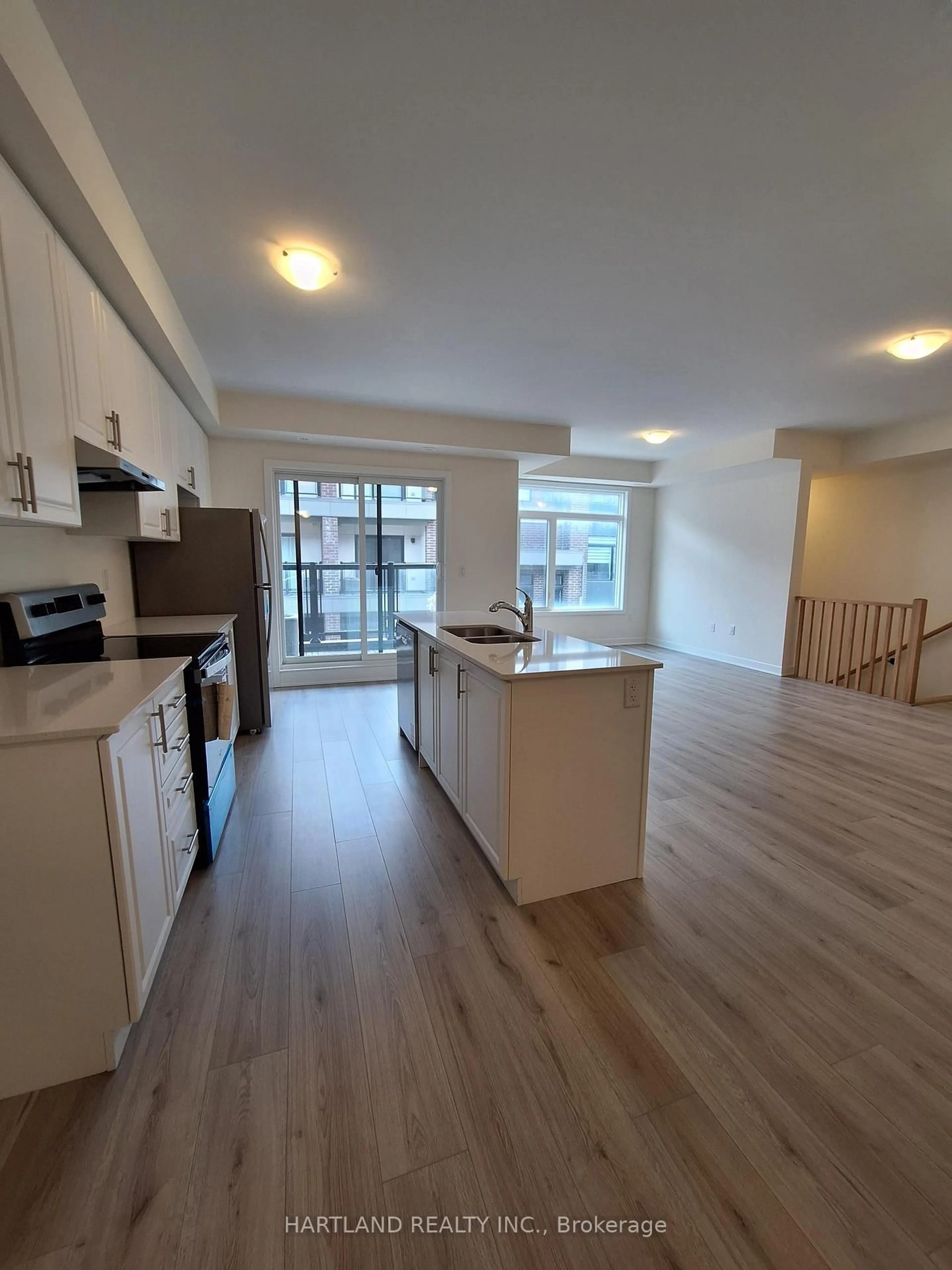 Open concept kitchen, wood/laminate floor for 1695 Dersan St #1409, Pickering Ontario L1X 0S9