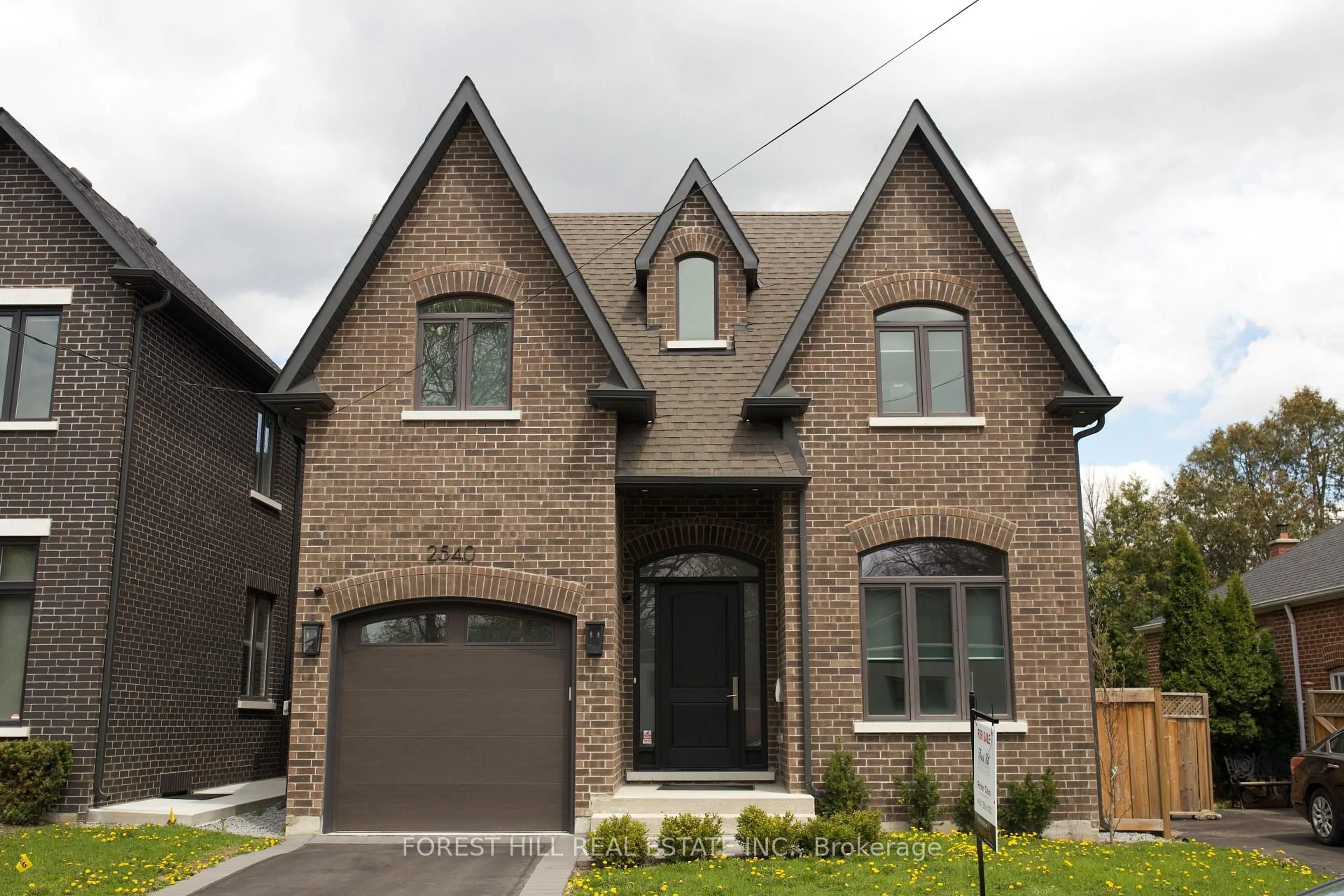 Home with brick exterior material, street for 2540 St Clair Ave, Toronto Ontario M4B 1M1