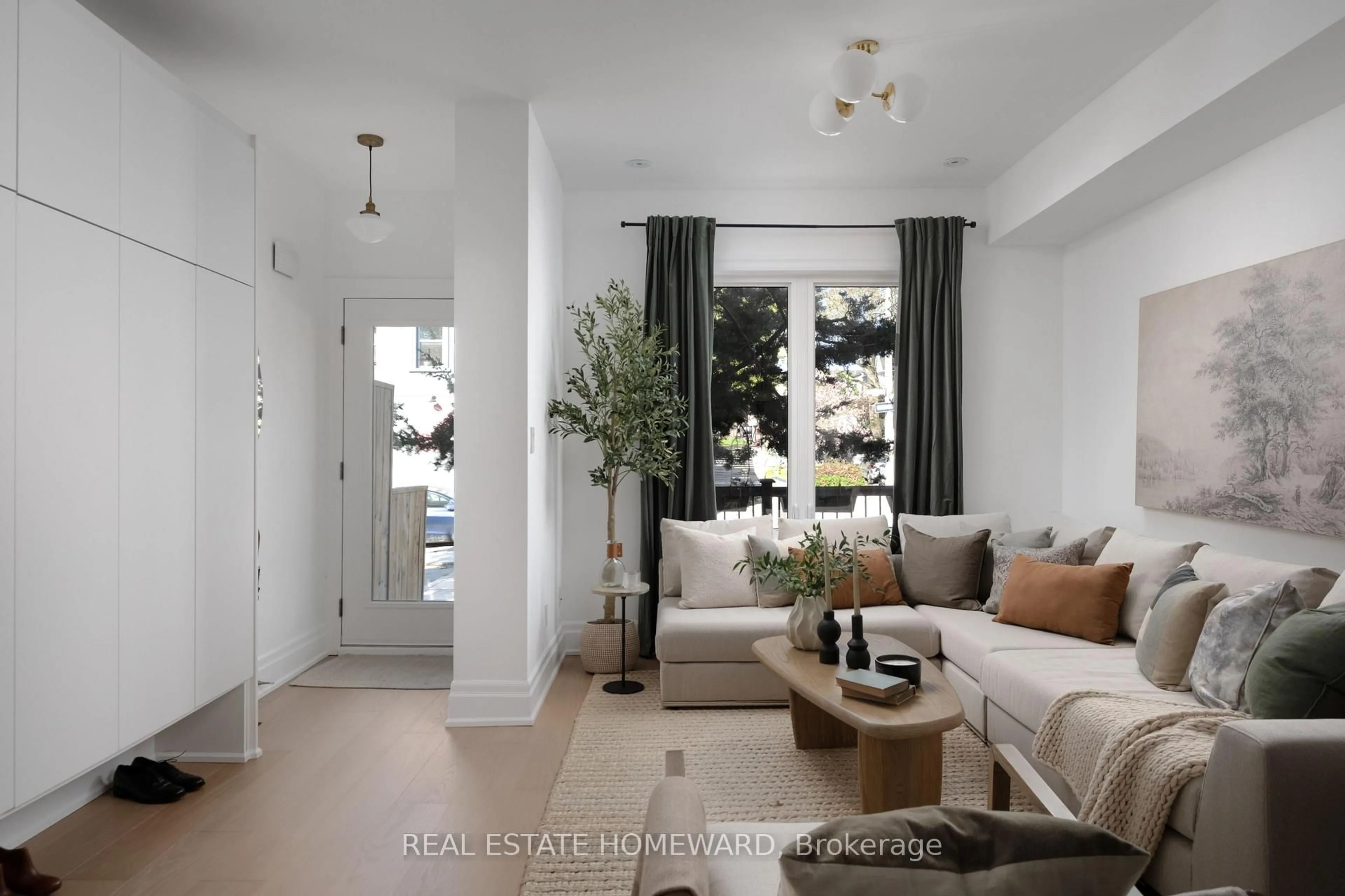 Living room with furniture, unknown for 631 Logan Ave, Toronto Ontario M4K 3C2