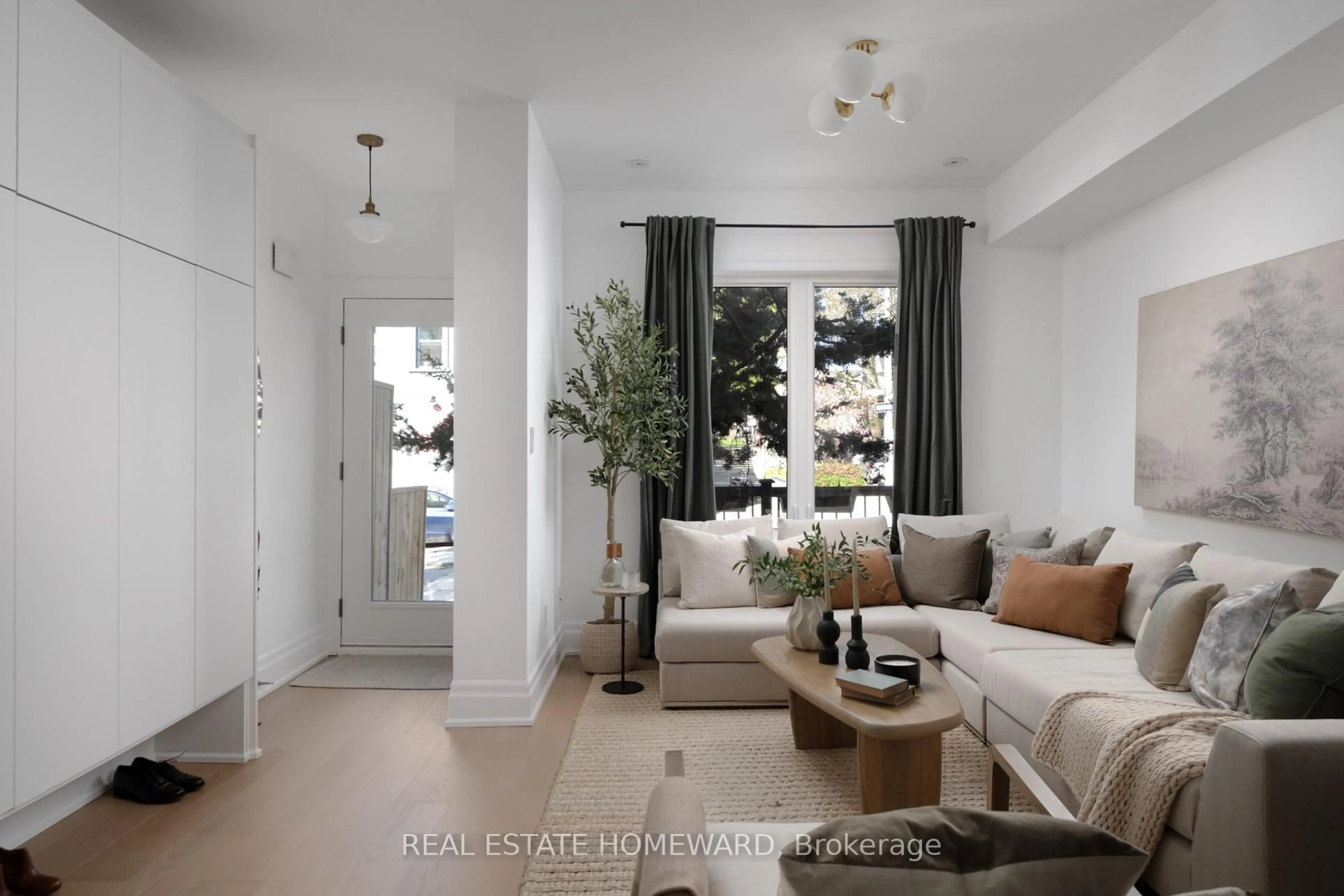 Living room with furniture, unknown for 631 Logan Ave, Toronto Ontario M4K 3C2