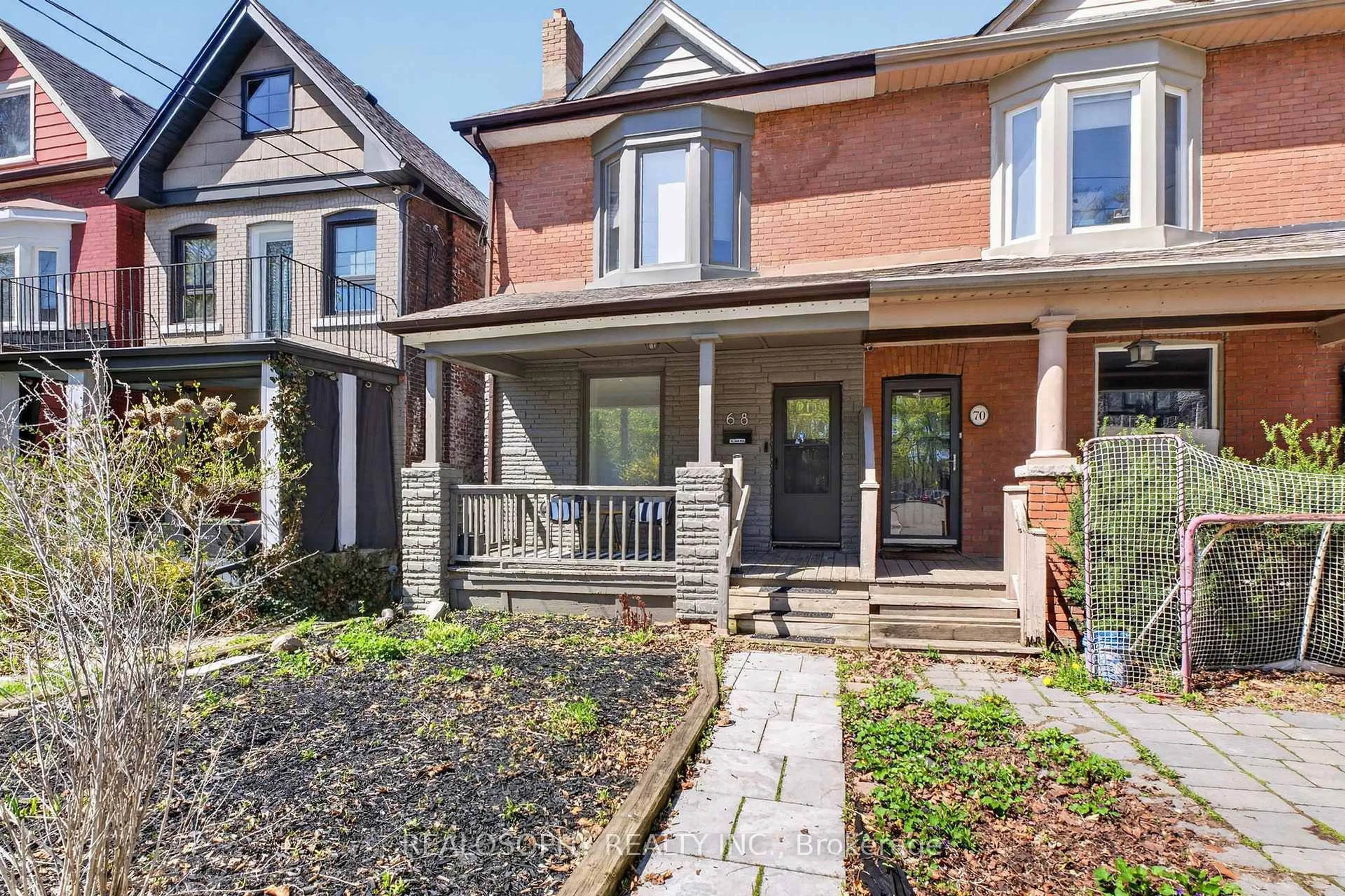 Home with brick exterior material, street for 68 Prust Ave, Toronto Ontario M4L 2M8