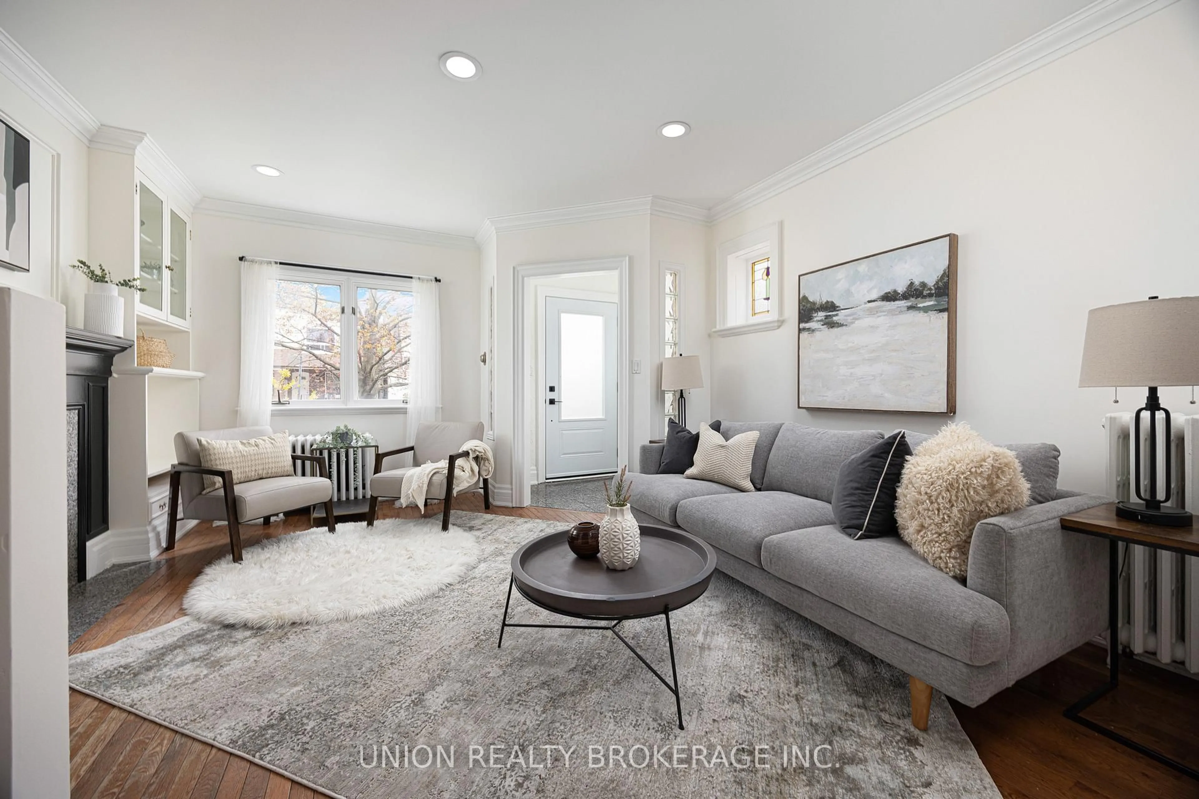 Living room with furniture, unknown for 212 Dewhurst Blvd, Toronto Ontario M4J 3K3