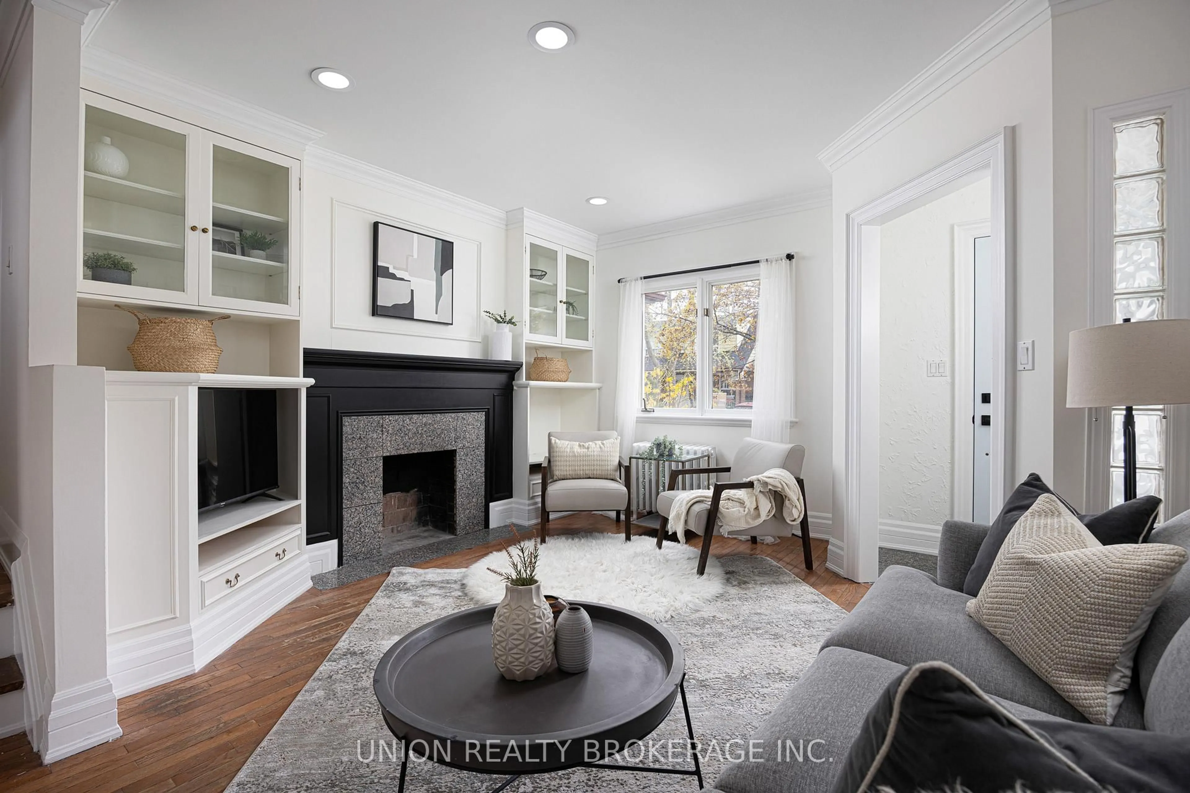 Living room with furniture, unknown for 212 Dewhurst Blvd, Toronto Ontario M4J 3K3