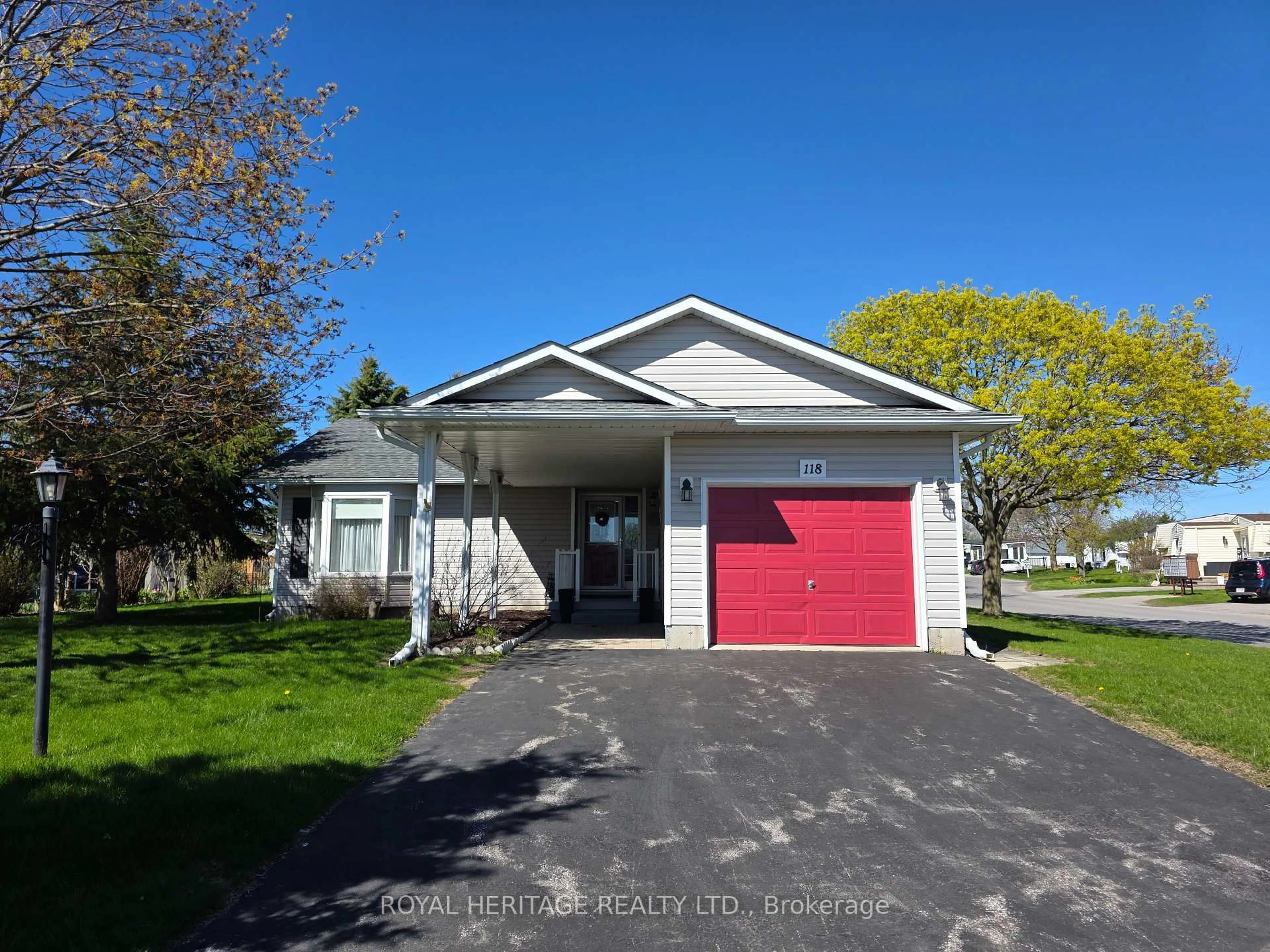 Home with vinyl exterior material, street for 118 Bluffs Rd, Clarington Ontario L1B 1A8