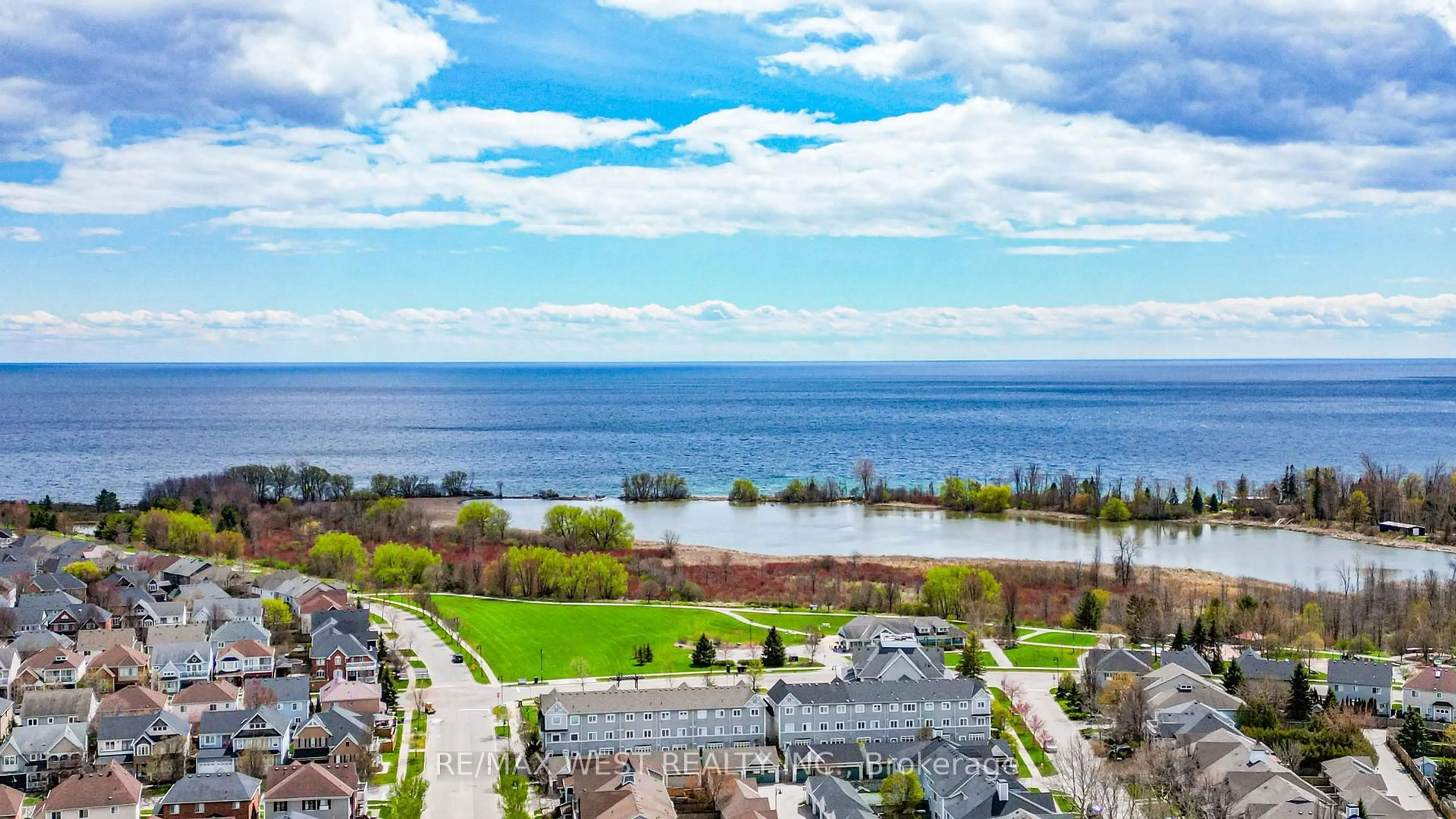 A pic from outside/outdoor area/front of a property/back of a property/a pic from drone, water/lake/river/ocean view for 112 Handley Cres, Ajax Ontario L1Z 1L7