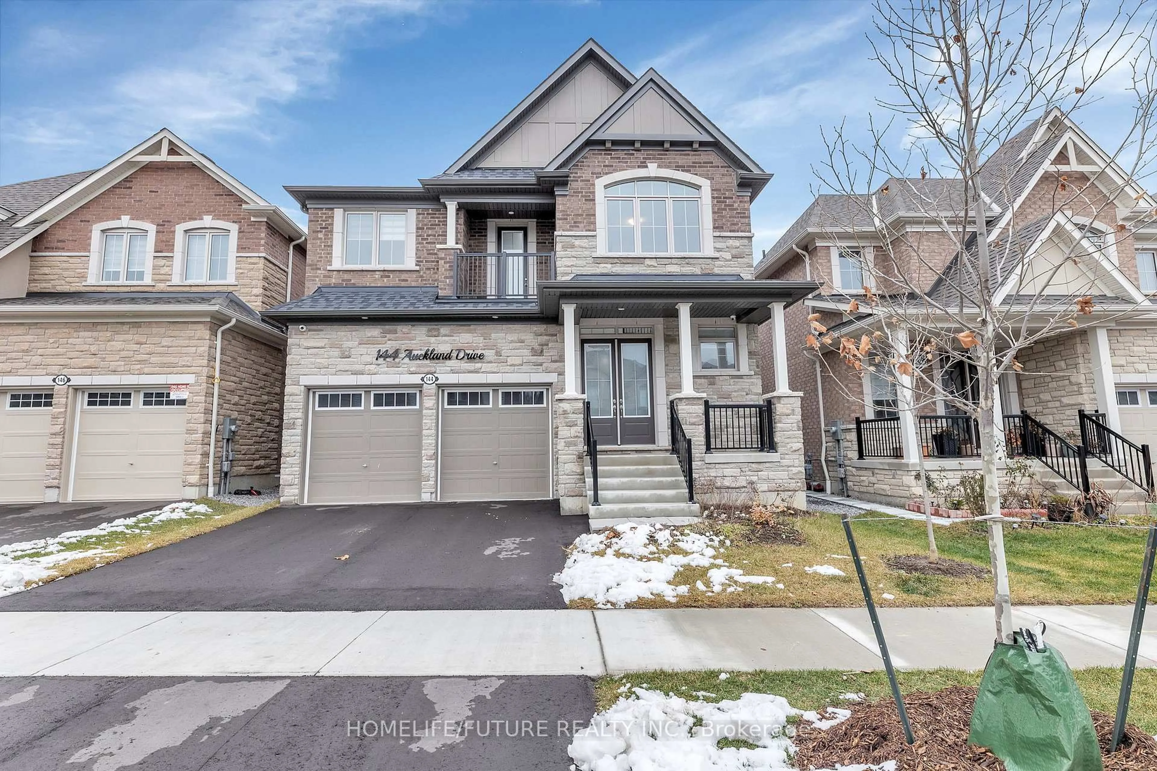 Home with brick exterior material, street for 144 Auckland Dr, Whitby Ontario L1P 0J2