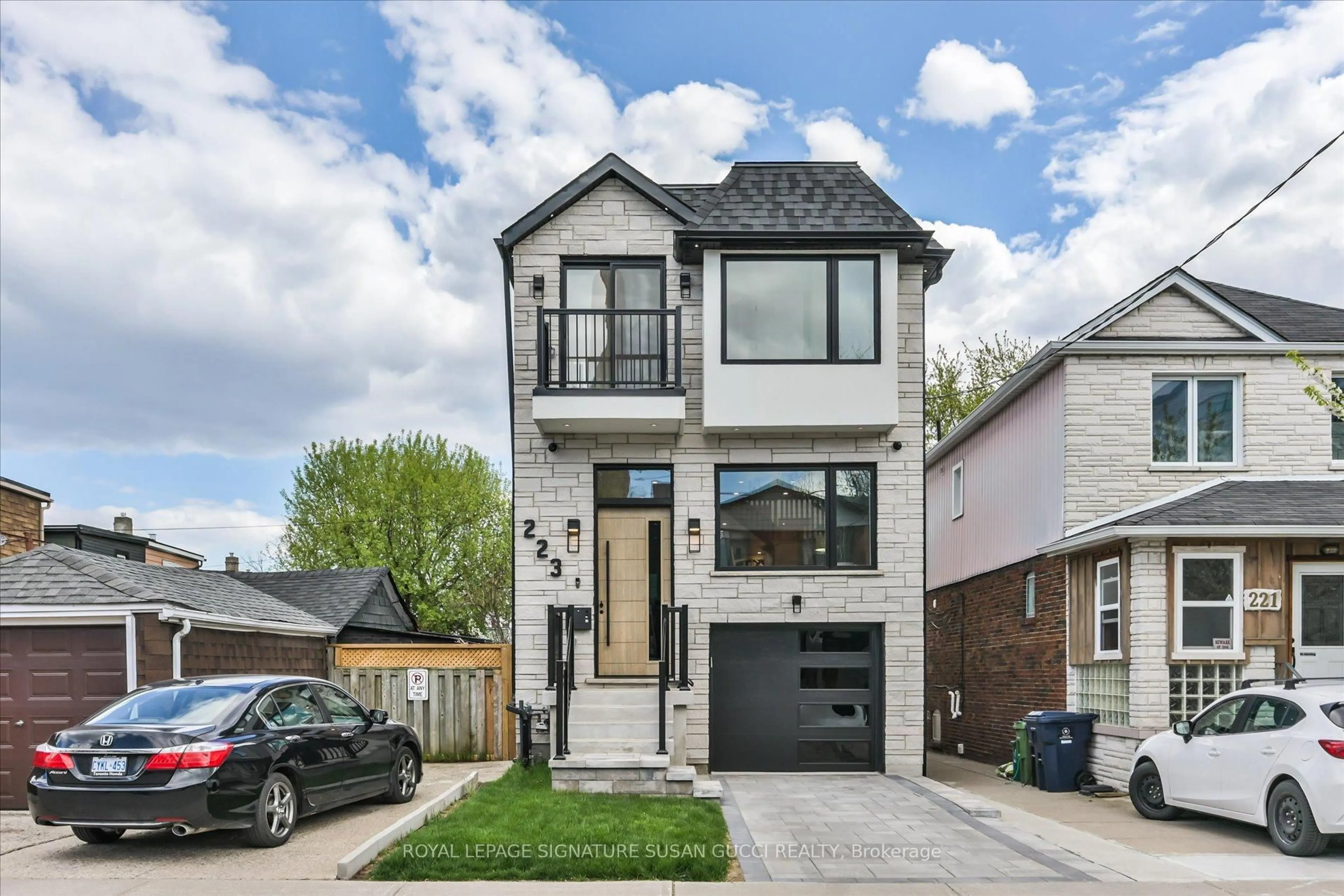 Home with brick exterior material, street for 223 Queensdale Ave, Toronto Ontario M4C 2B1