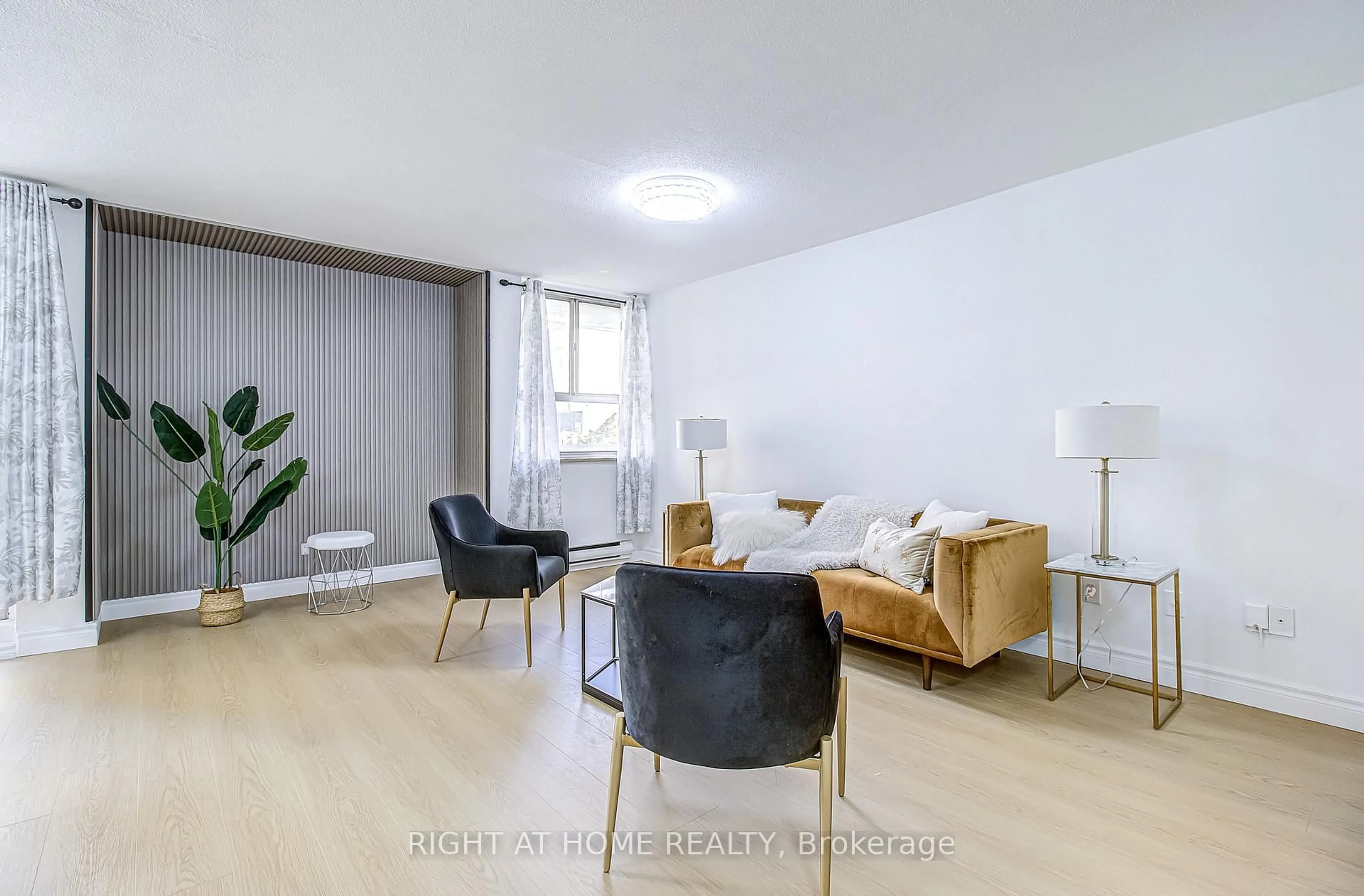 Living room with furniture, unknown for 8 Crescent Town Rd #409, Toronto Ontario M4C 5L3