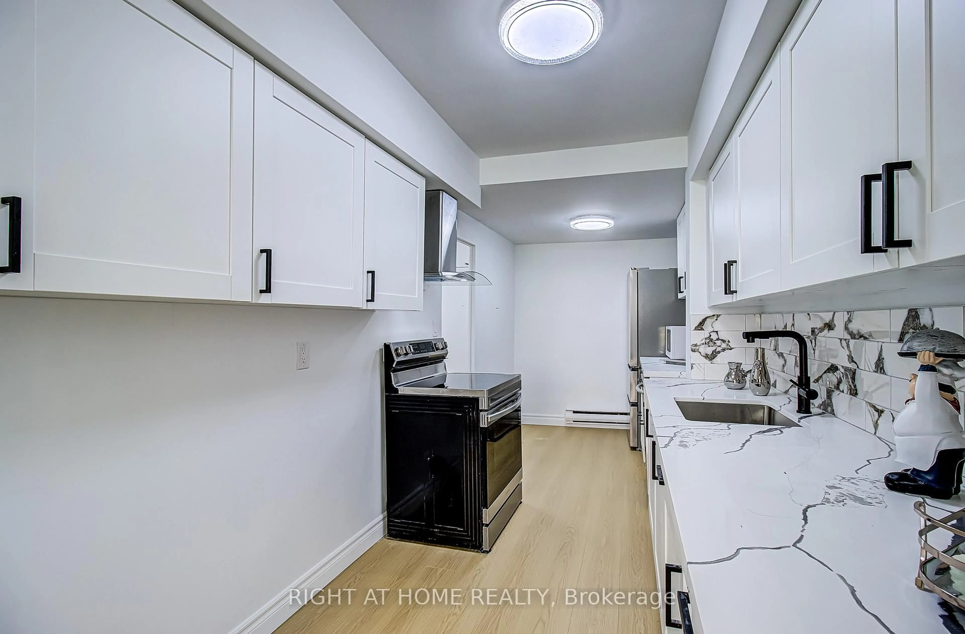 Standard kitchen, unknown for 8 Crescent Town Rd #409, Toronto Ontario M4C 5L3