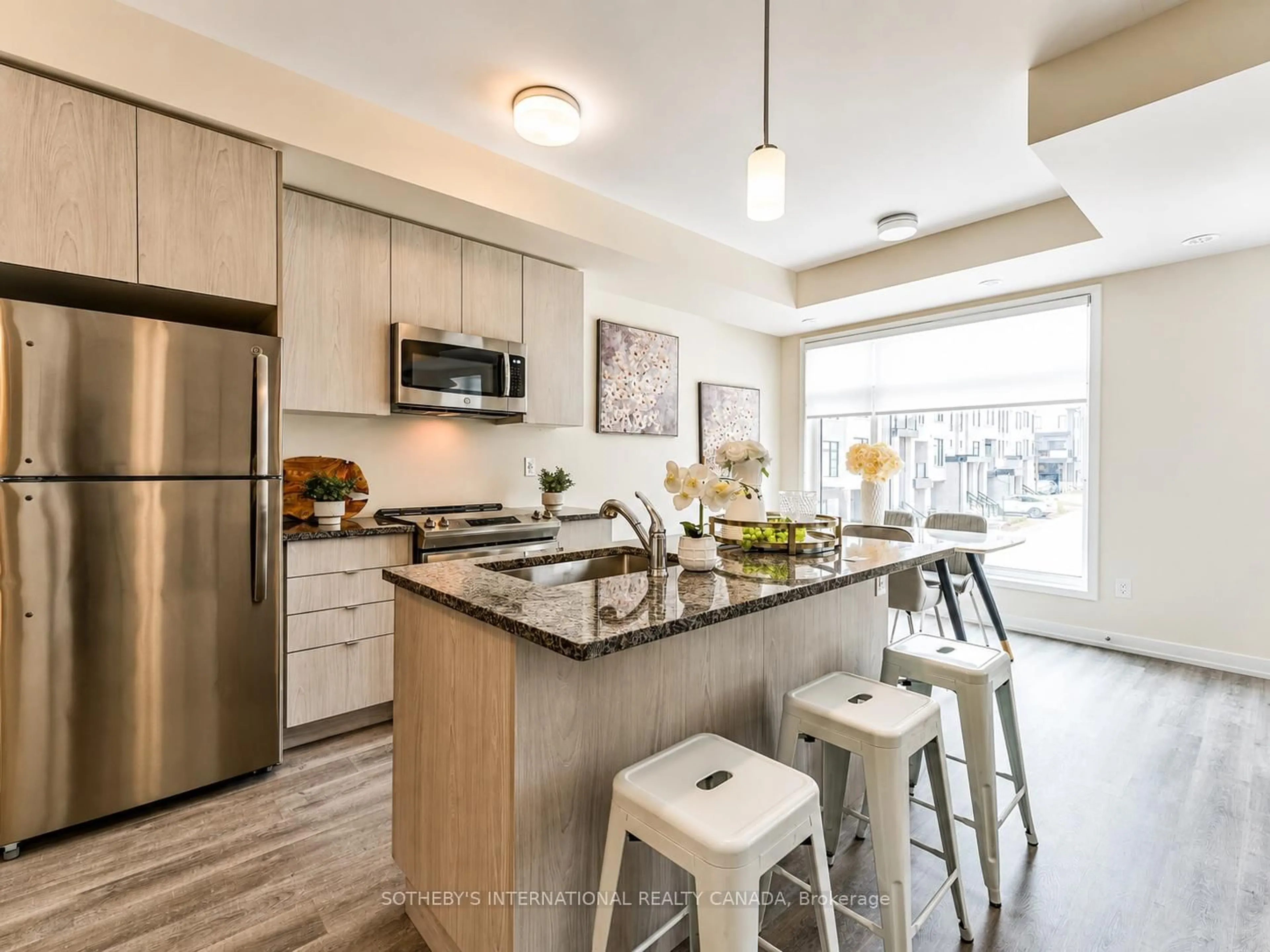 Open concept kitchen, unknown for 2550 Castlegate Crossing #419, Pickering Ontario L1X 0H6