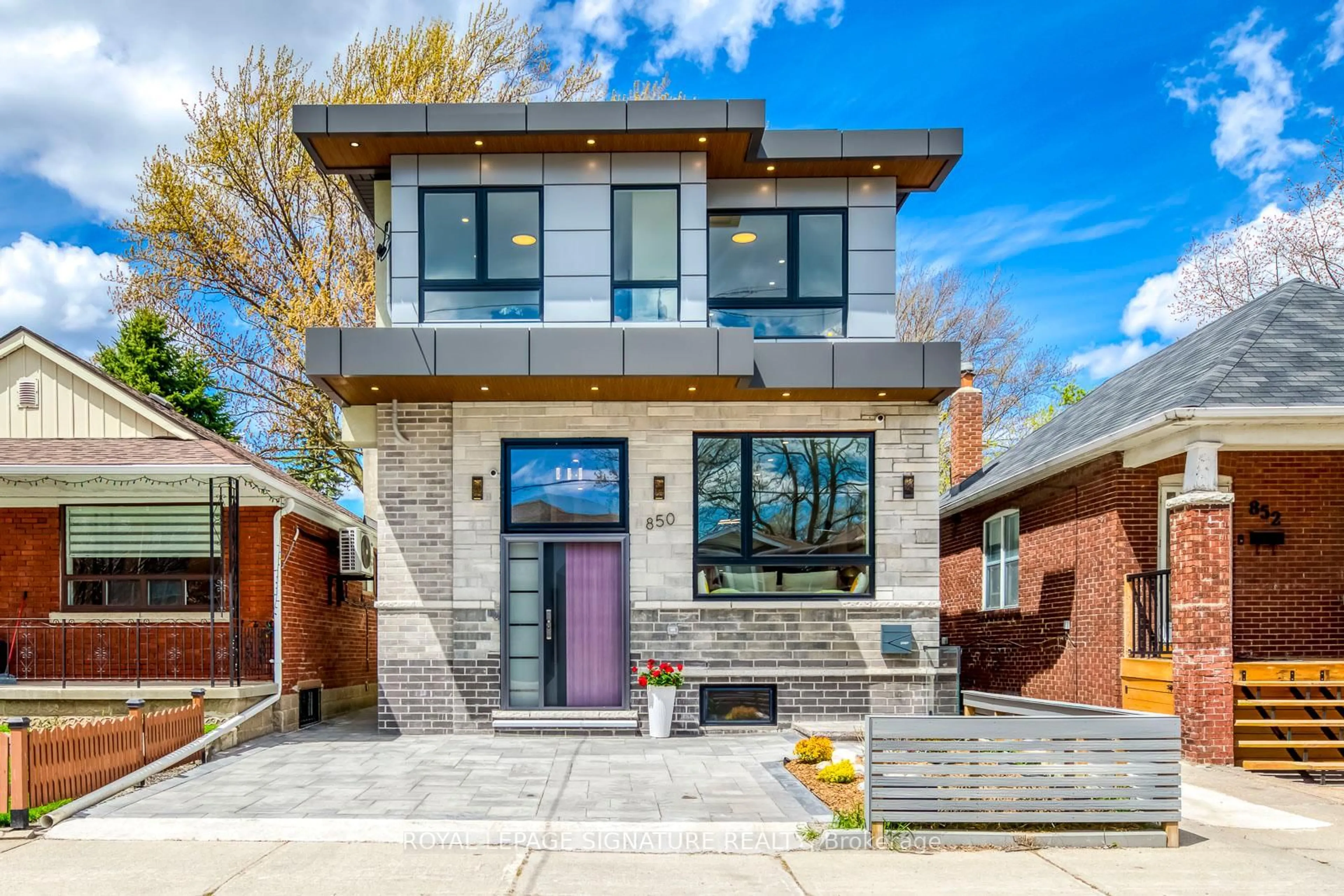 Home with brick exterior material, street for 850 Cosburn Ave, Toronto Ontario M4C 2W2