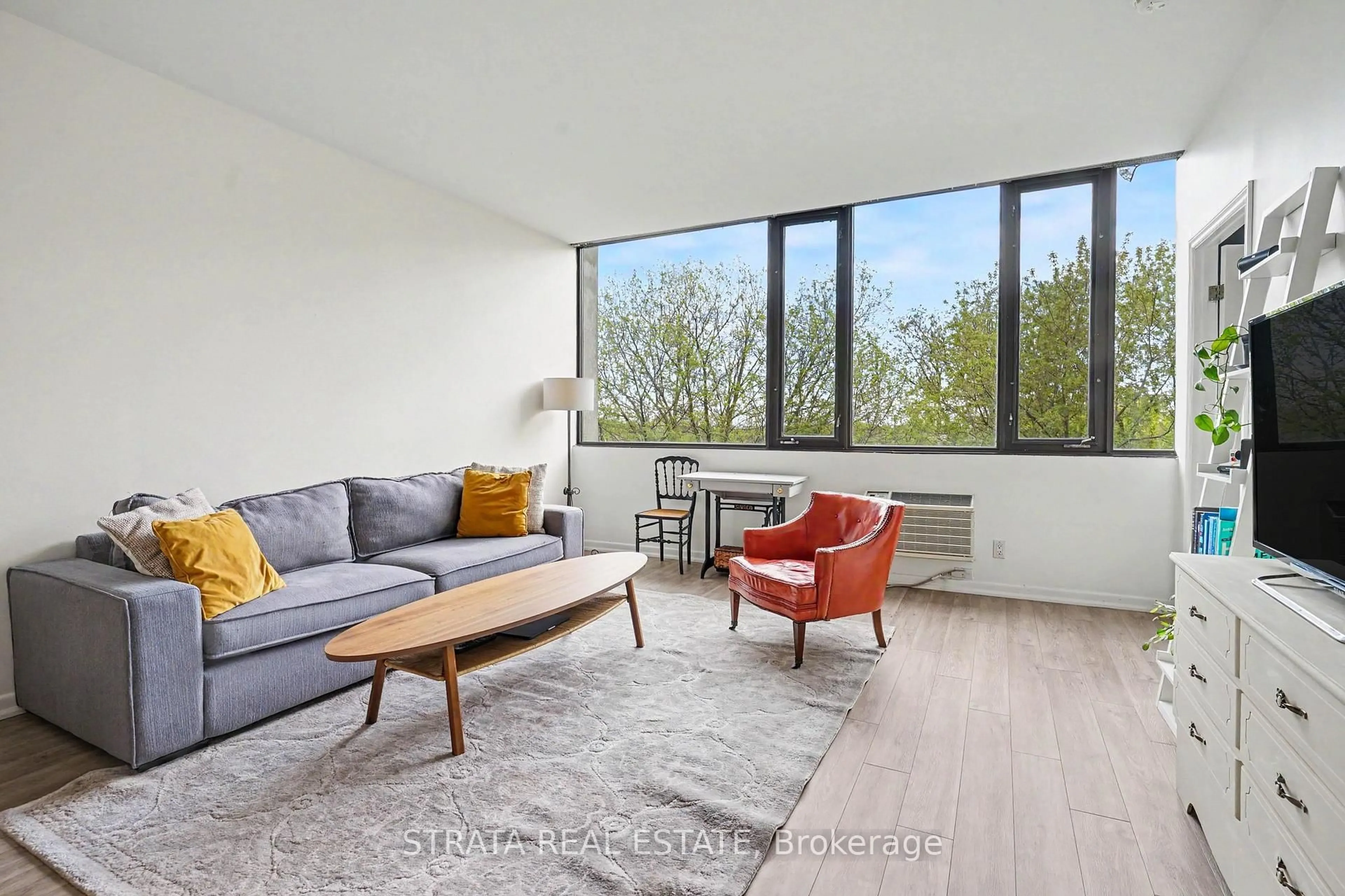 Living room with furniture, unknown for 300 Coxwell Ave #406, Toronto Ontario M4L 3B6