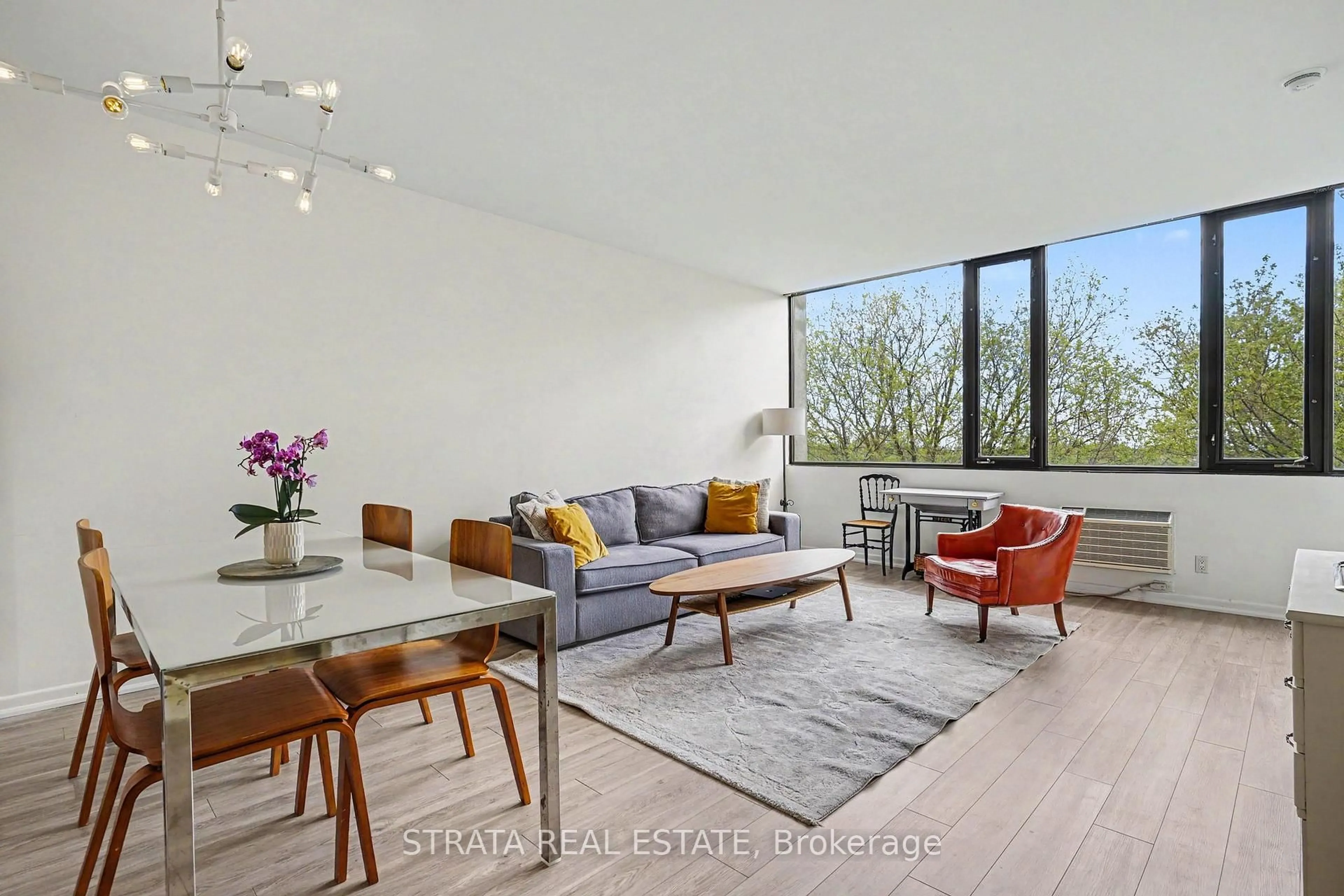 Living room with furniture, unknown for 300 Coxwell Ave #406, Toronto Ontario M4L 3B6