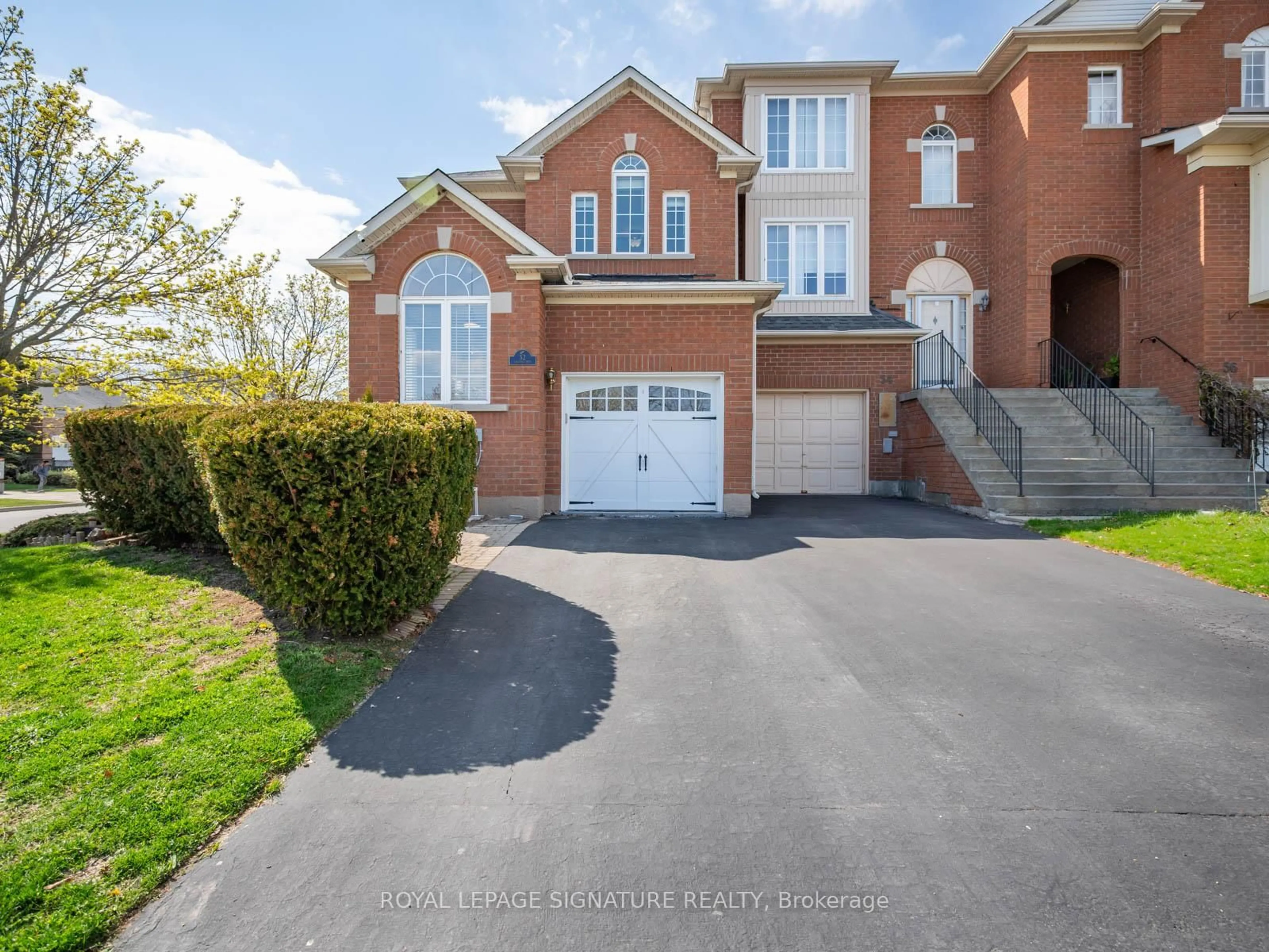 Home with brick exterior material, street for 52 Lakeridge Dr, Toronto Ontario M1C 5E3