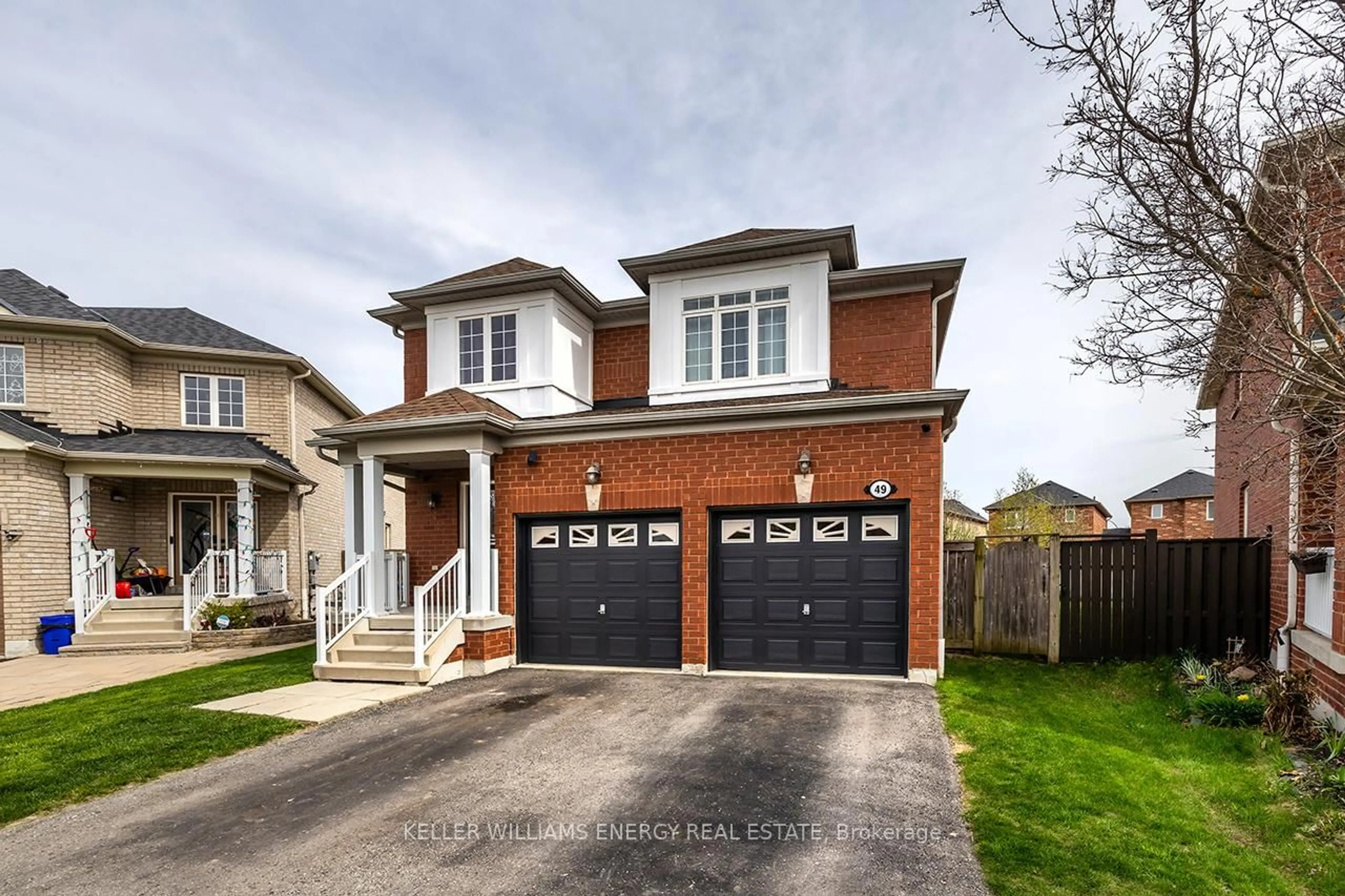 Home with brick exterior material, street for 49 Harkness Dr, Whitby Ontario L1R 0C5