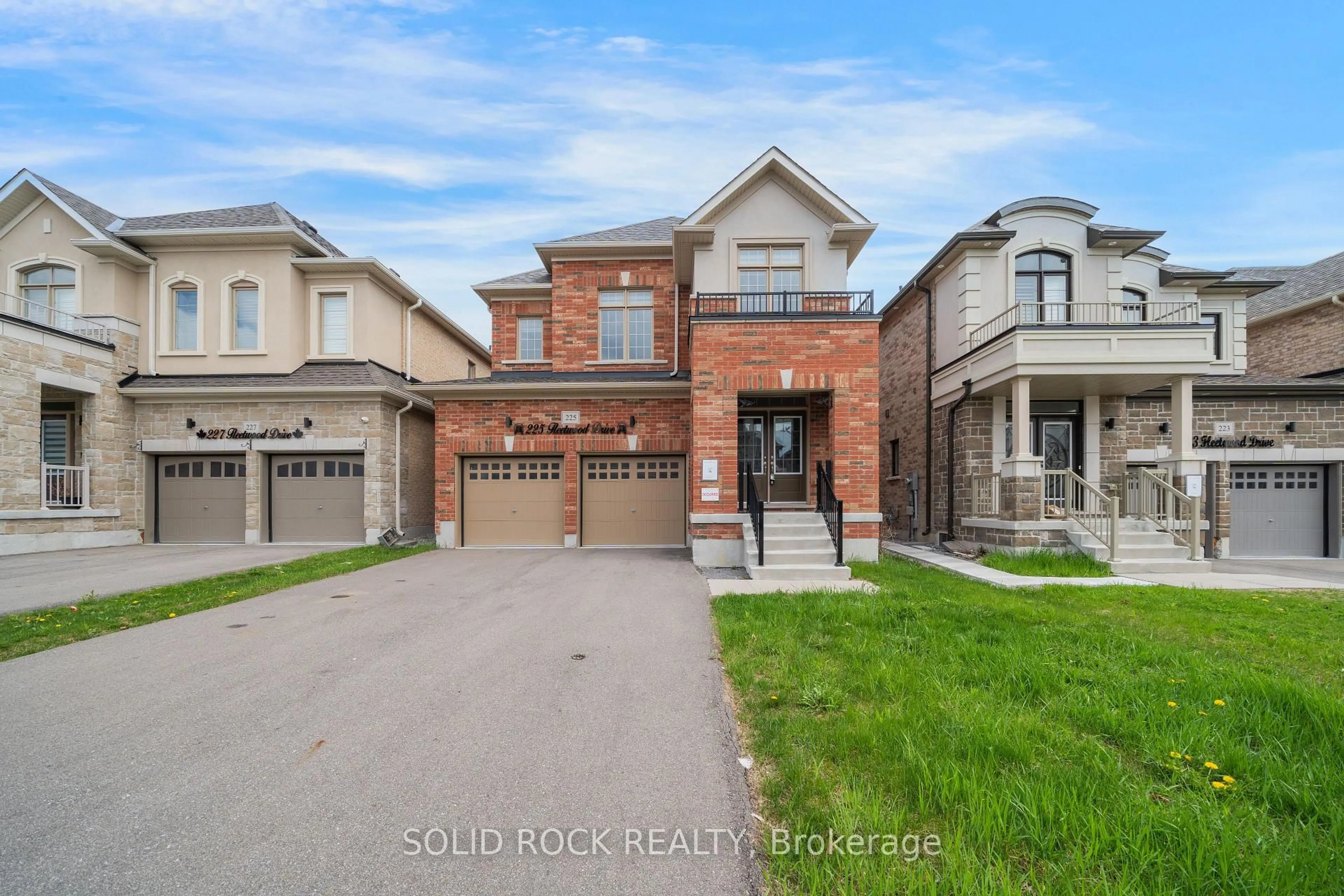 Home with brick exterior material, street for 225 Fleetwood Dr, Oshawa Ontario L1T 3E7