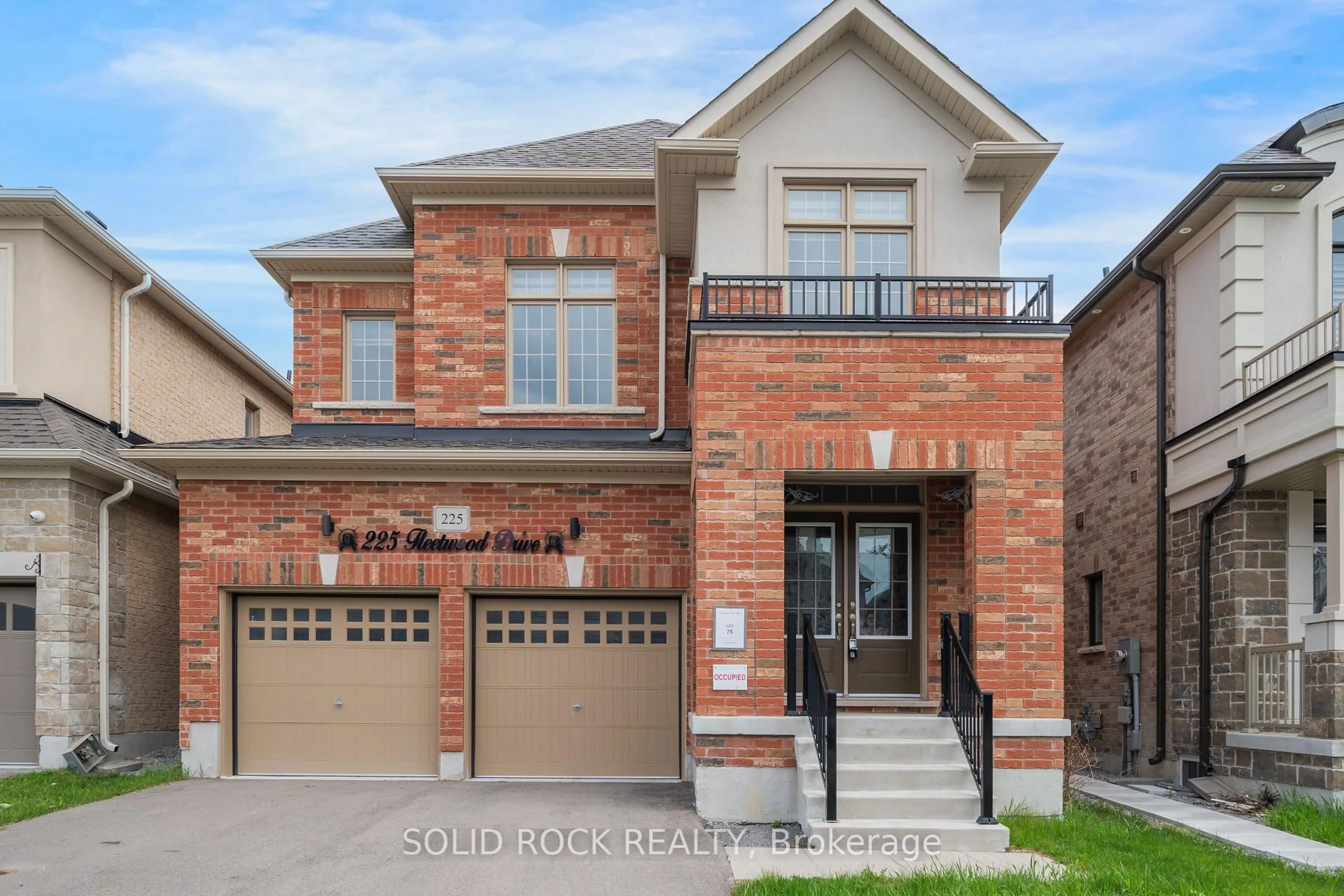 Home with brick exterior material, street for 225 Fleetwood Dr, Oshawa Ontario L1T 3E7