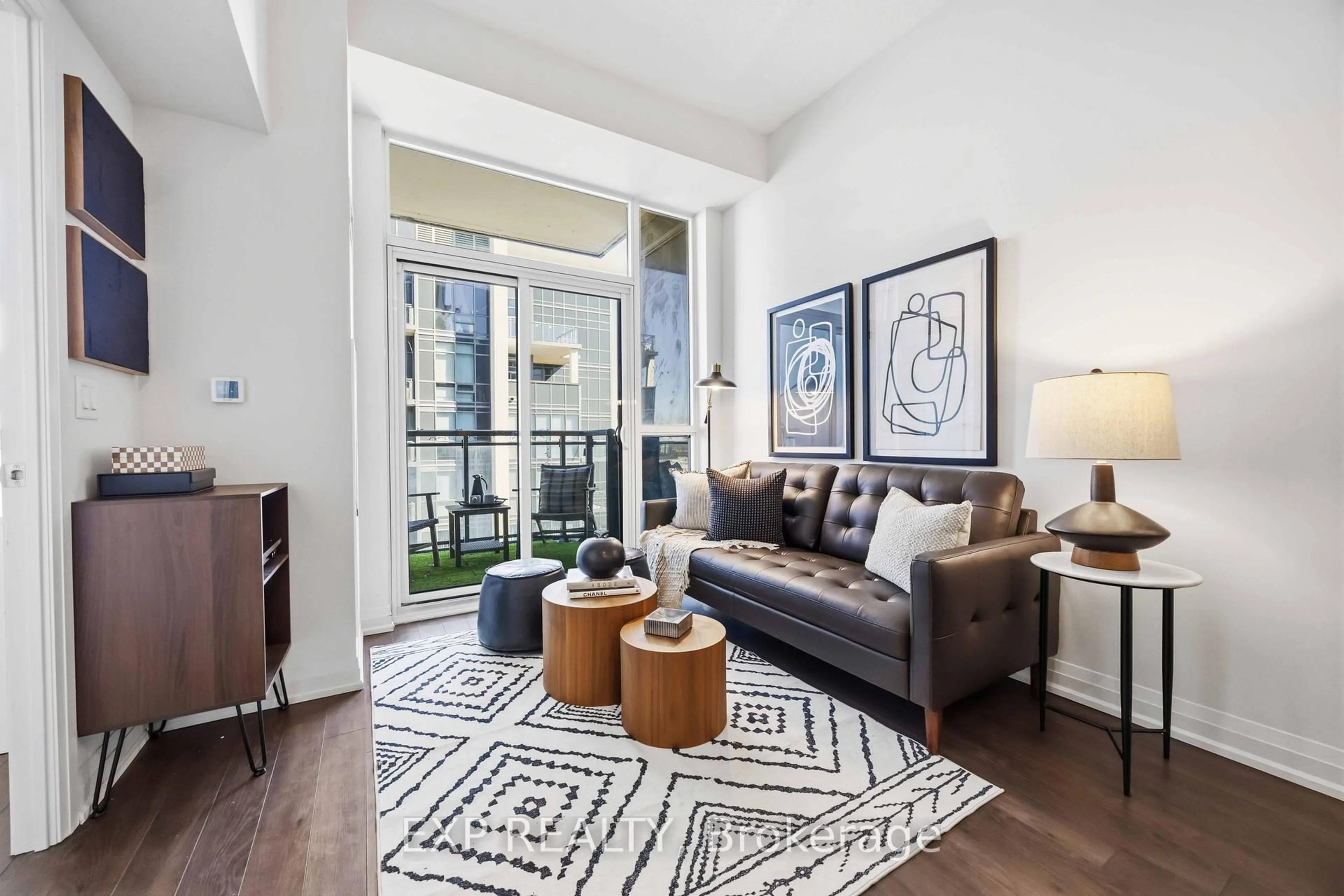 Living room with furniture, carpet floor for 20 Meadowglen Pl #2710, Toronto Ontario M1G 0A9