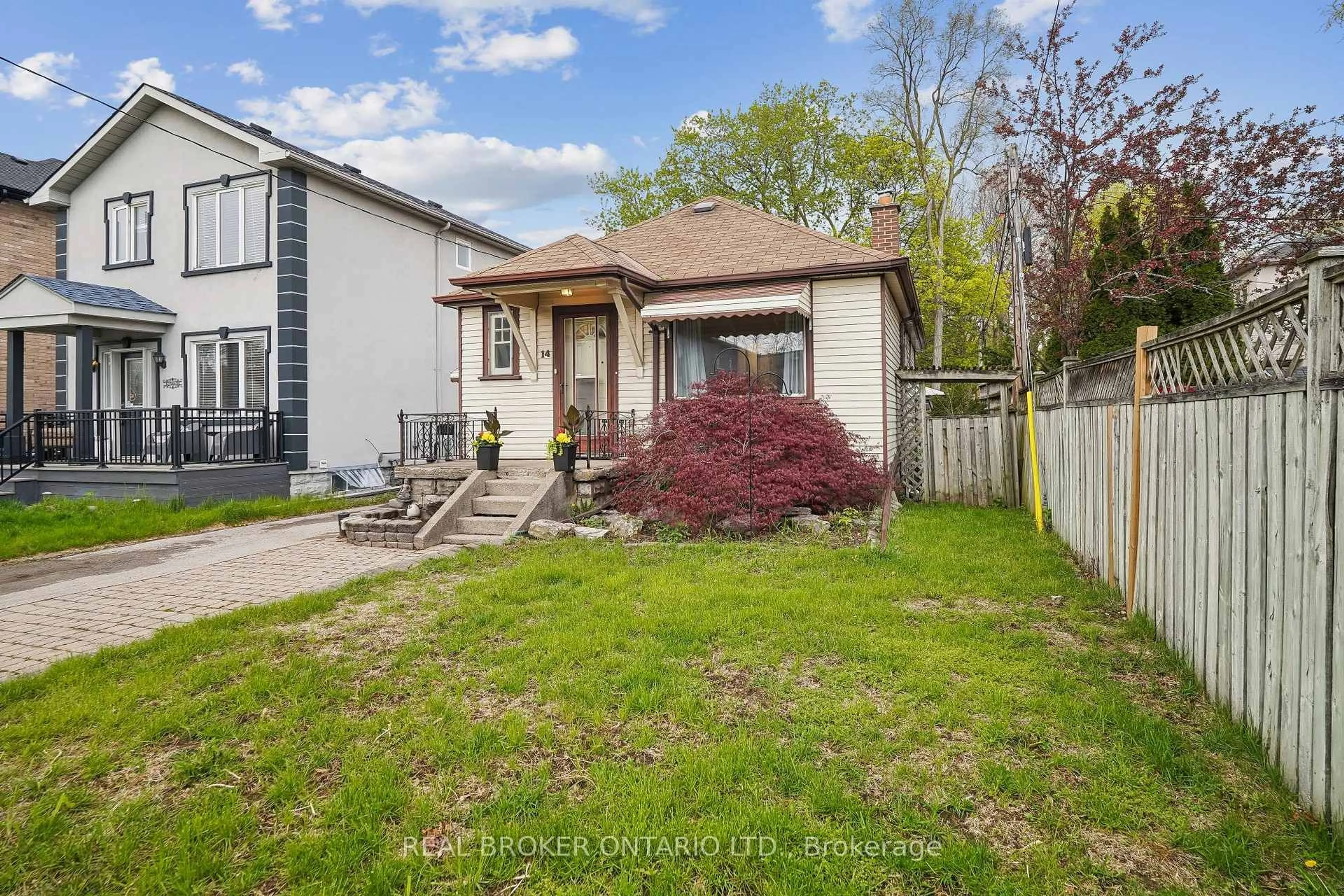 A pic from outside/outdoor area/front of a property/back of a property/a pic from drone, street for 14 Plains Rd, Toronto Ontario M4J 2R1