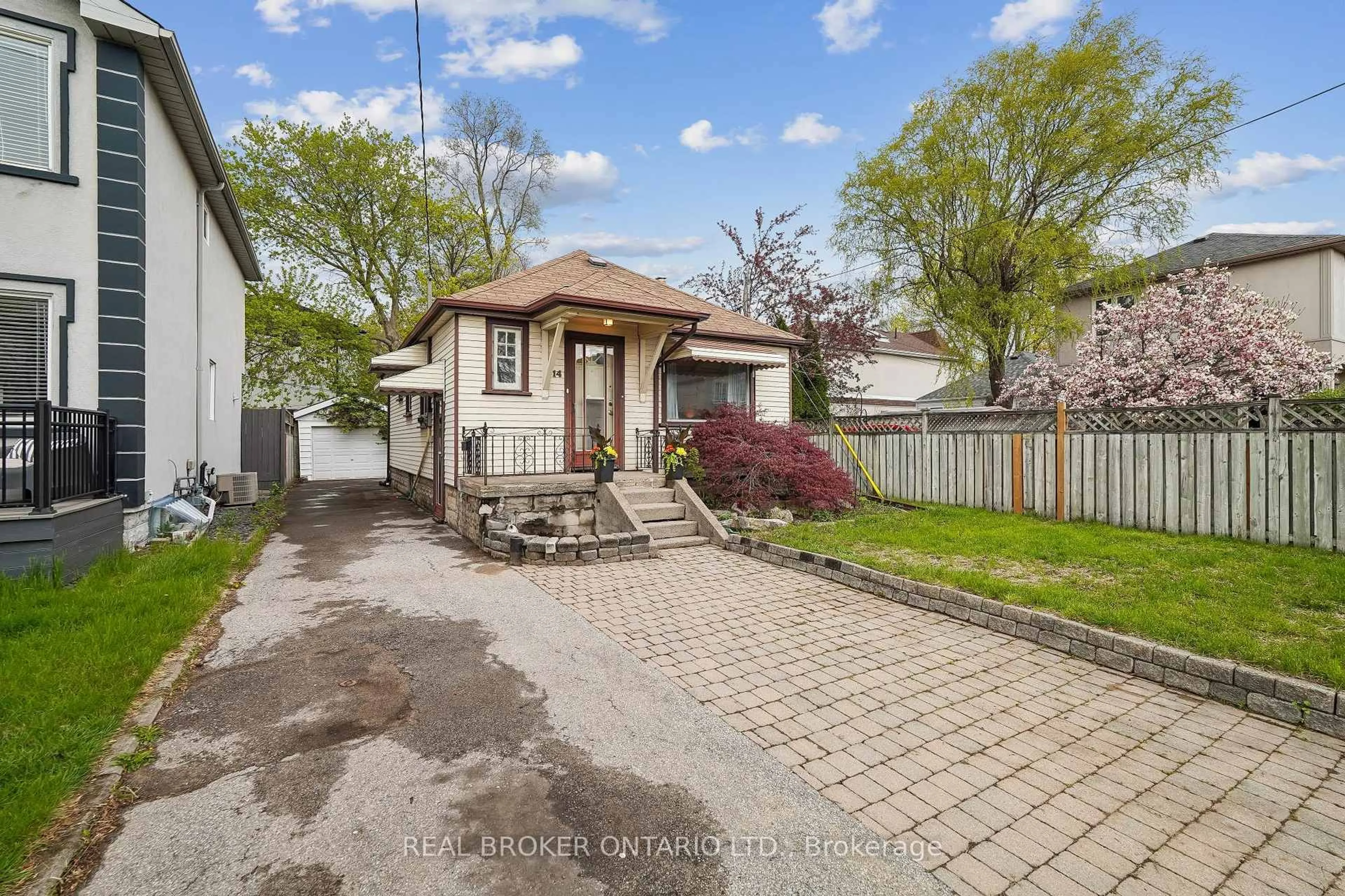 A pic from outside/outdoor area/front of a property/back of a property/a pic from drone, street for 14 Plains Rd, Toronto Ontario M4J 2R1