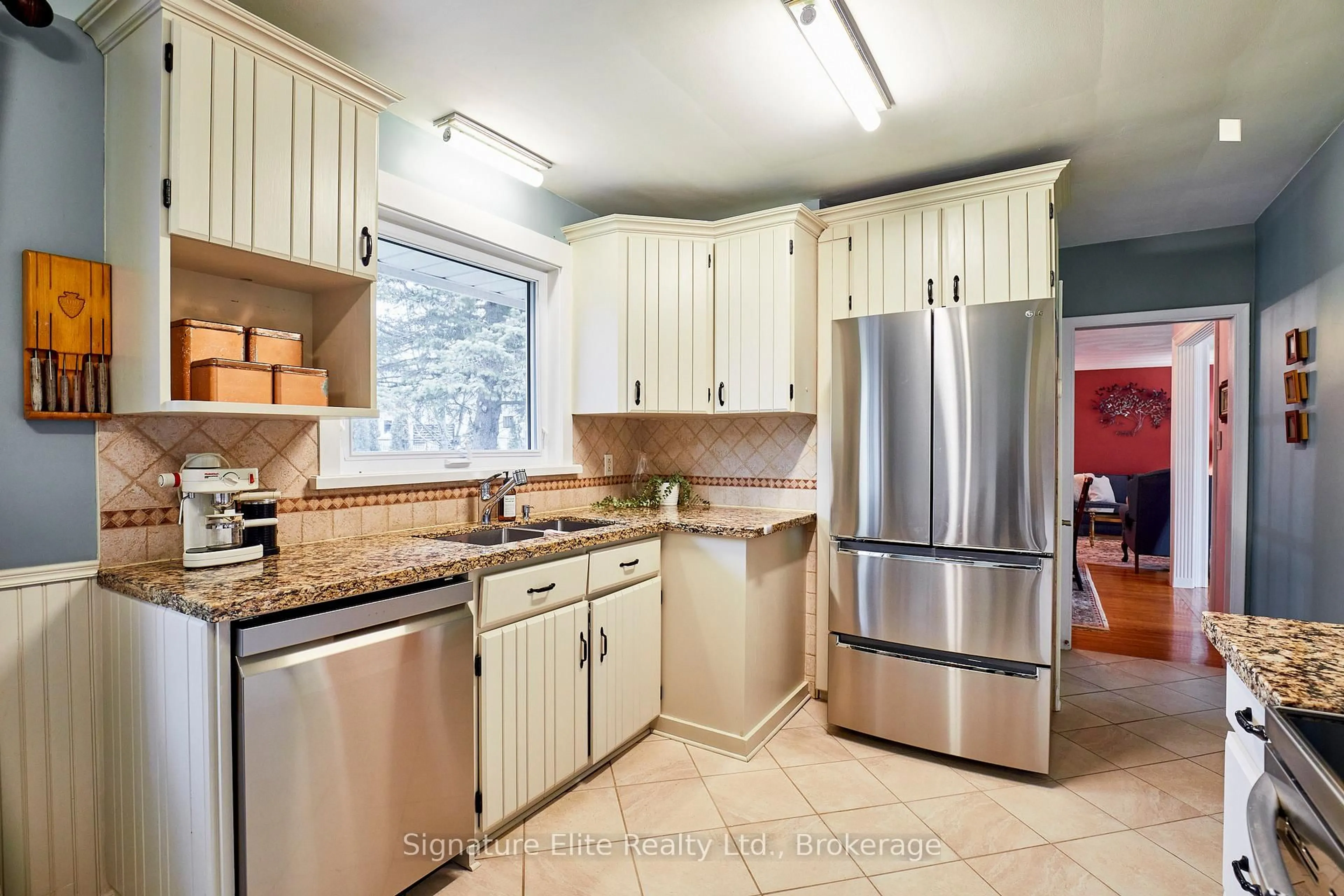 Open concept kitchen, ceramic/tile floor for 21 Regency Sq, Toronto Ontario M1E 1N4