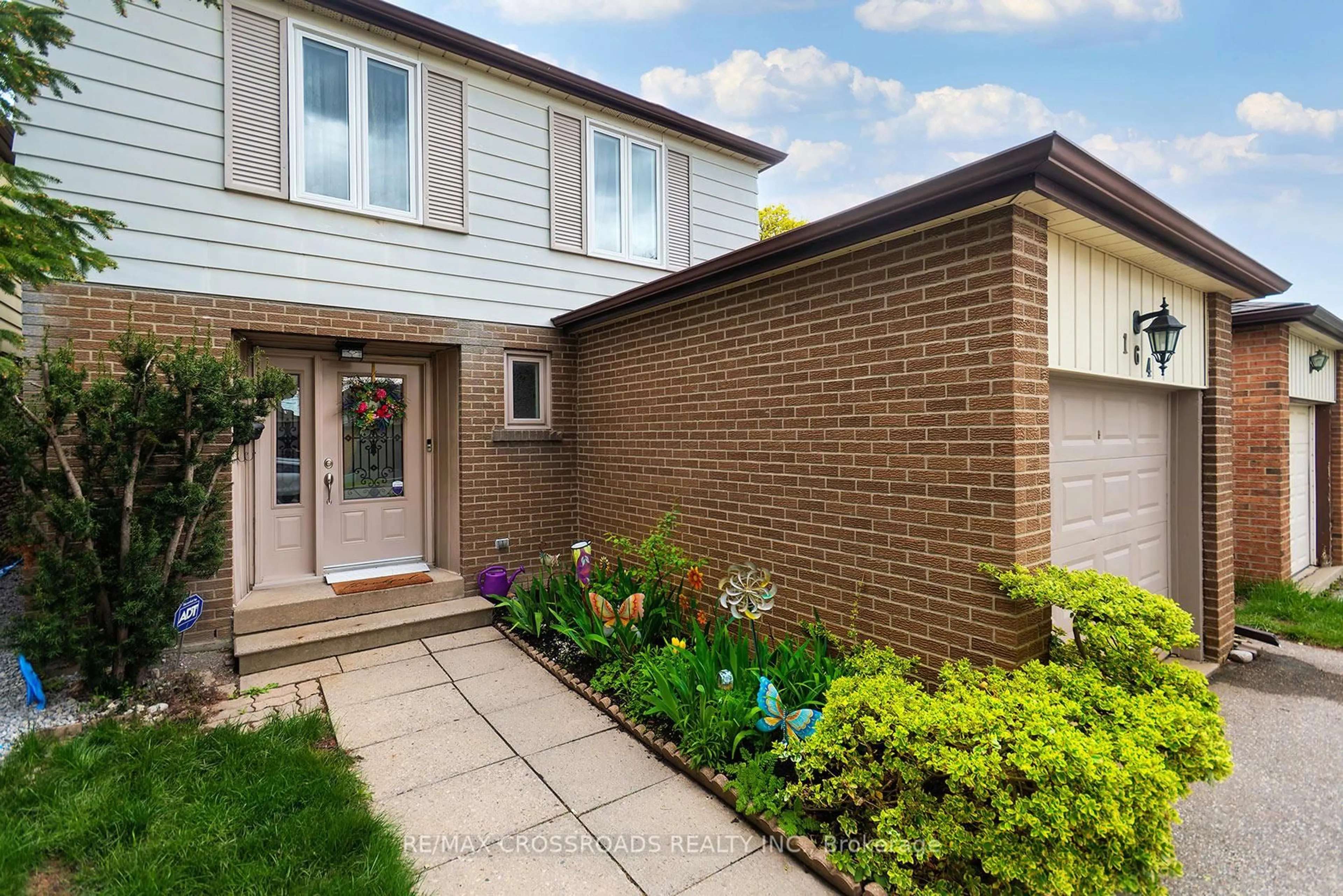 Home with brick exterior material, street for 164 Glen Spring Dr, Toronto Ontario M1W 1X8