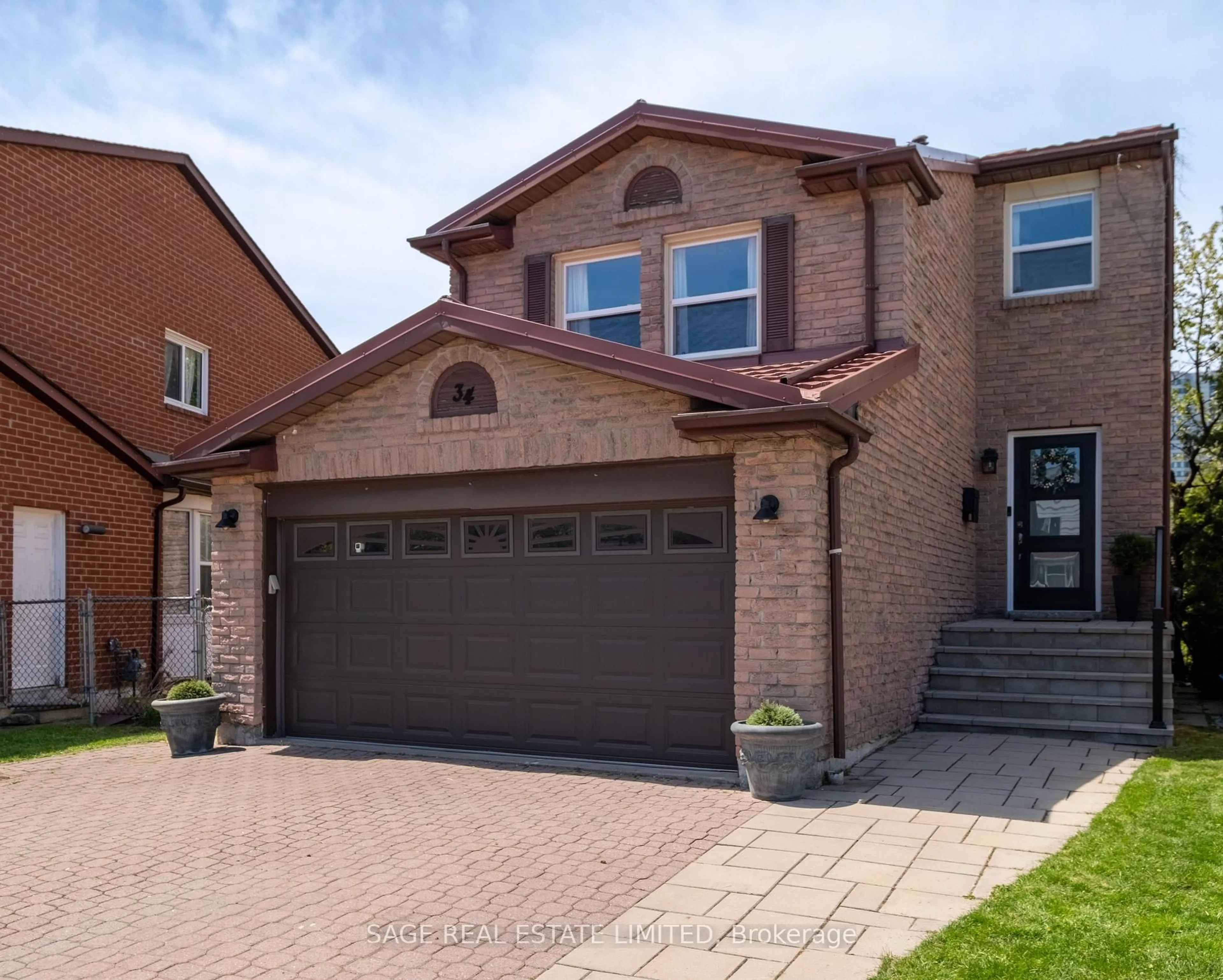 Home with brick exterior material, street for 34 Tambrook Dr, Toronto Ontario M1W 3L9